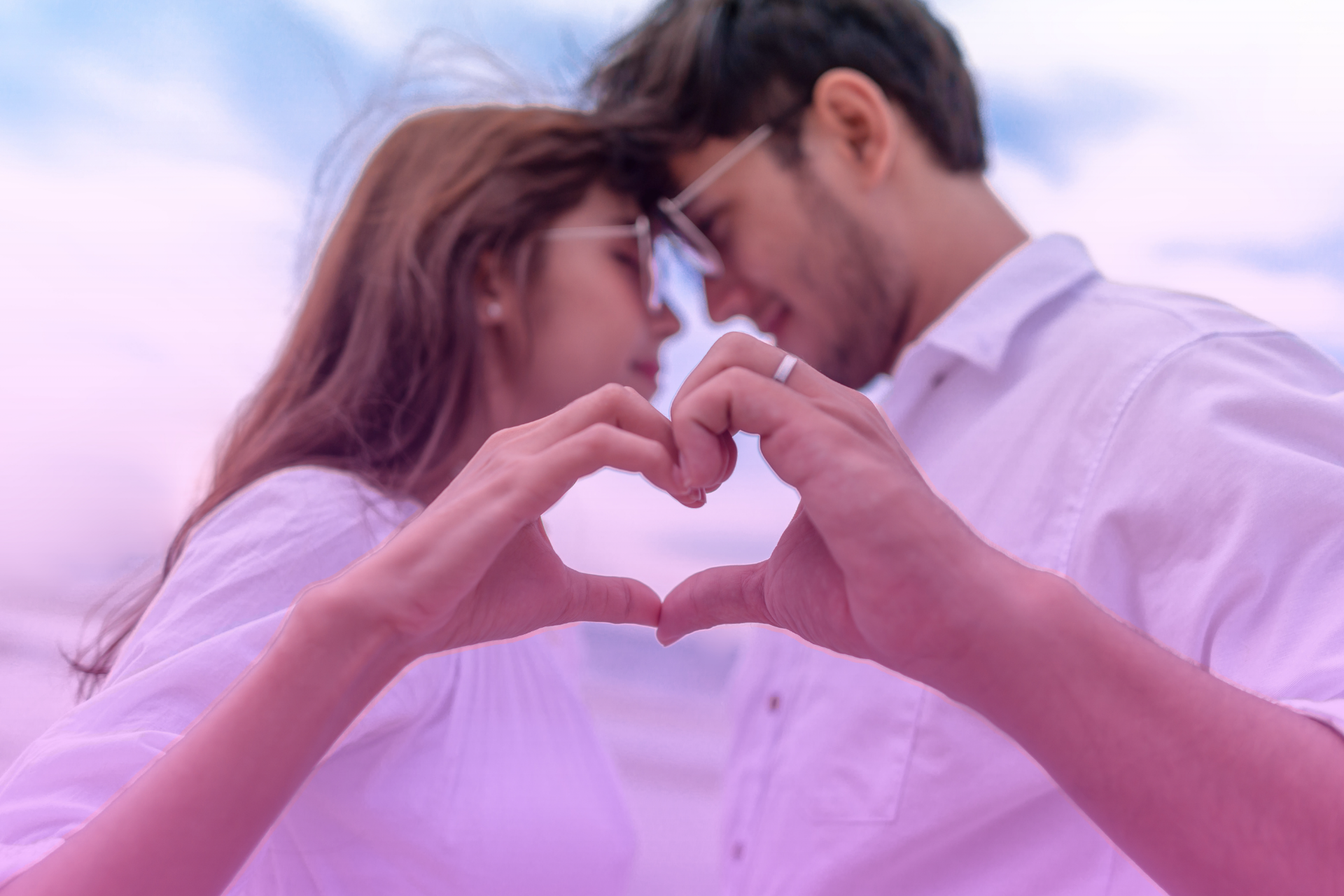 Pair looking deeply into one another's eyes