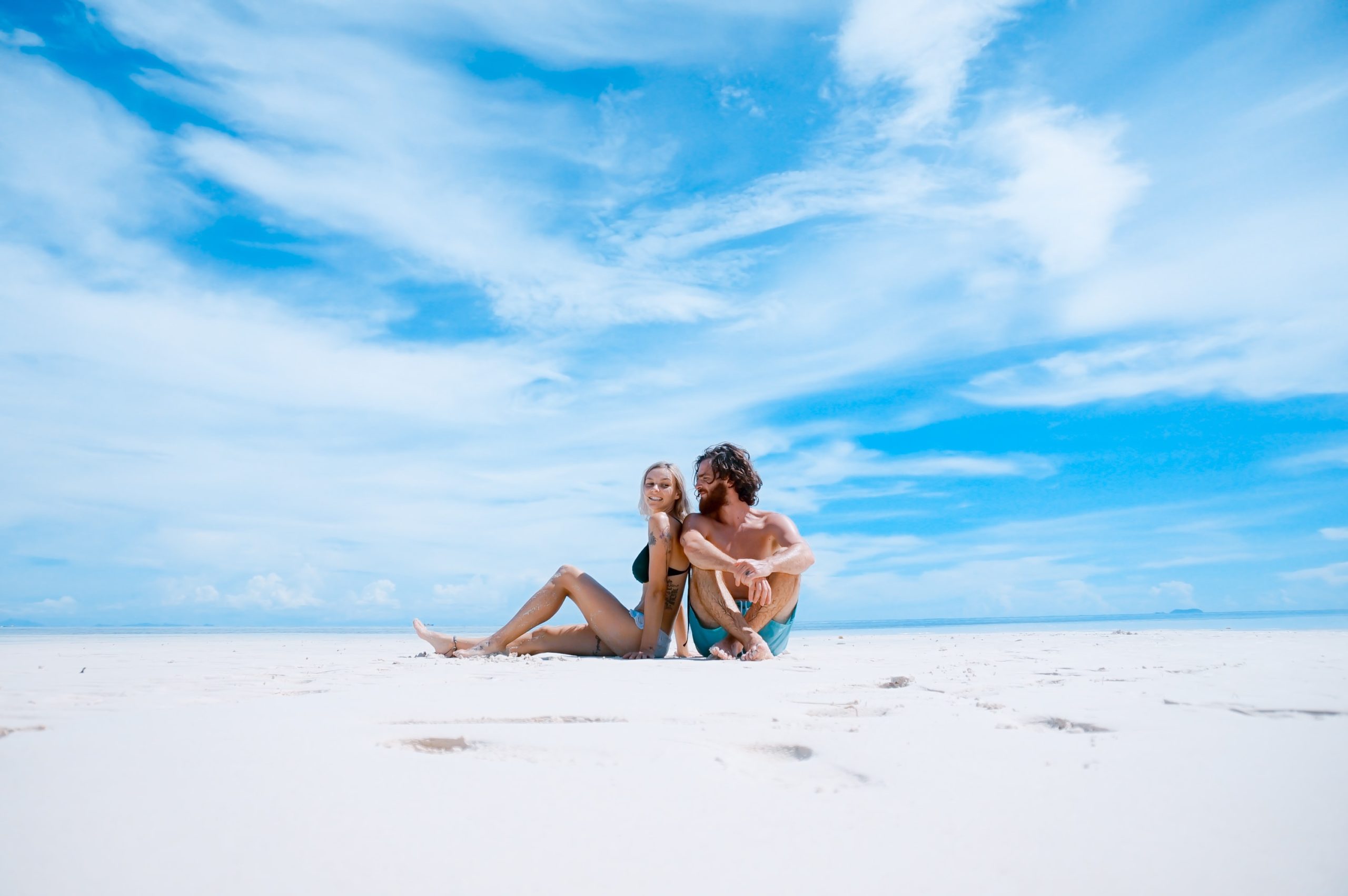couple sitting on a beach