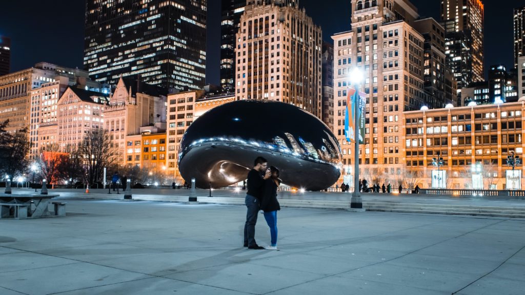 couple in front of the bean in chicago