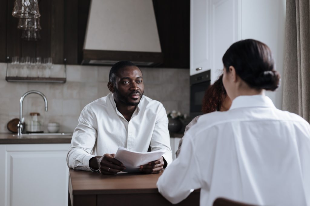 couple in the kitchen Addressing power imbalances in a prenuptial agreement