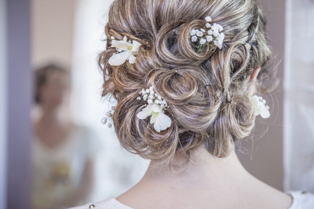 wedding hair in an updo with accessories