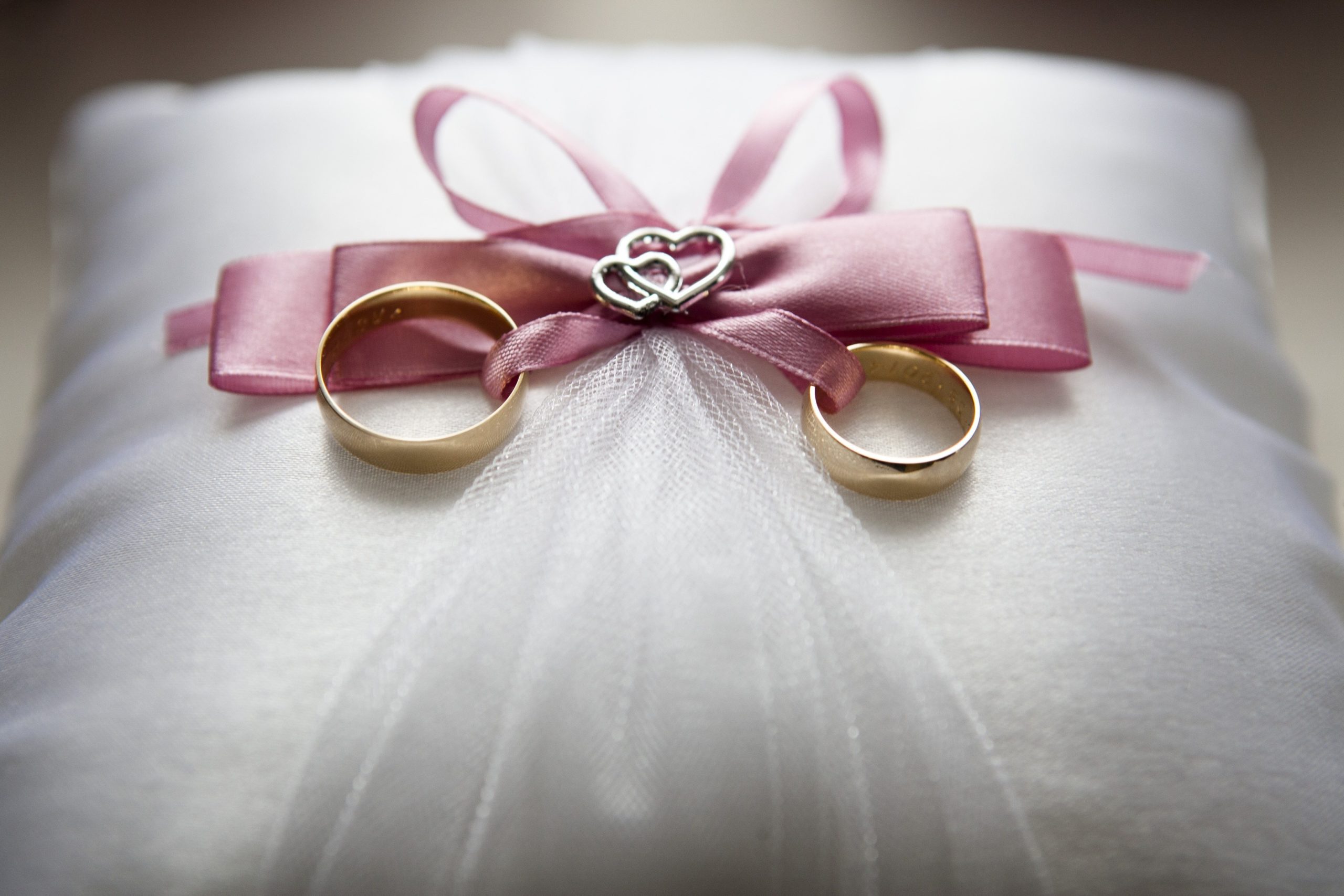 wedding rings on a pillow they need Protect Your Wedding And Engagement Rings With A Prenup