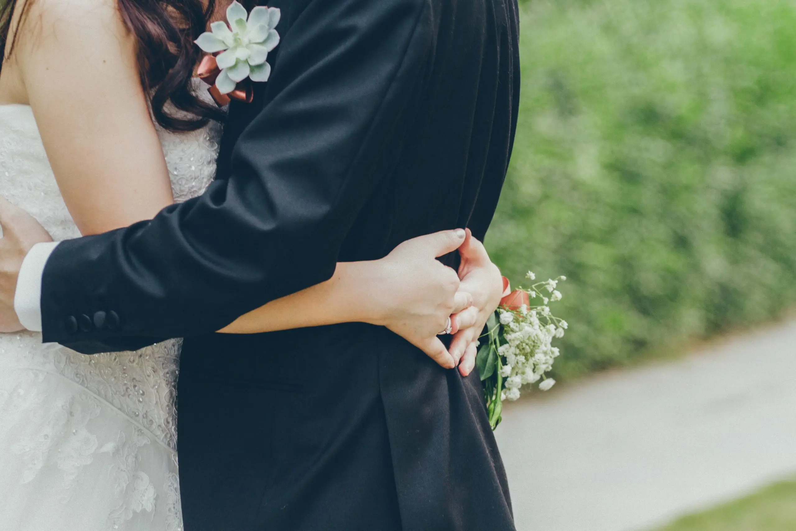 hugging spouses The History Of Marriage And Domestic Partnerships