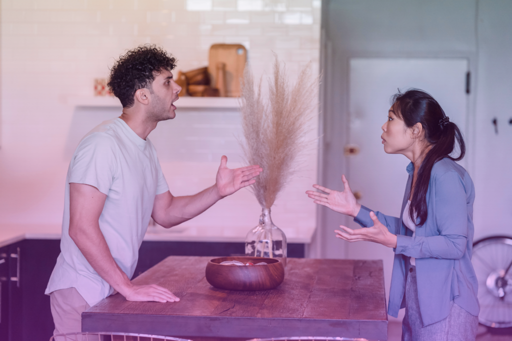 Couple having a serious conversation with concerned looks