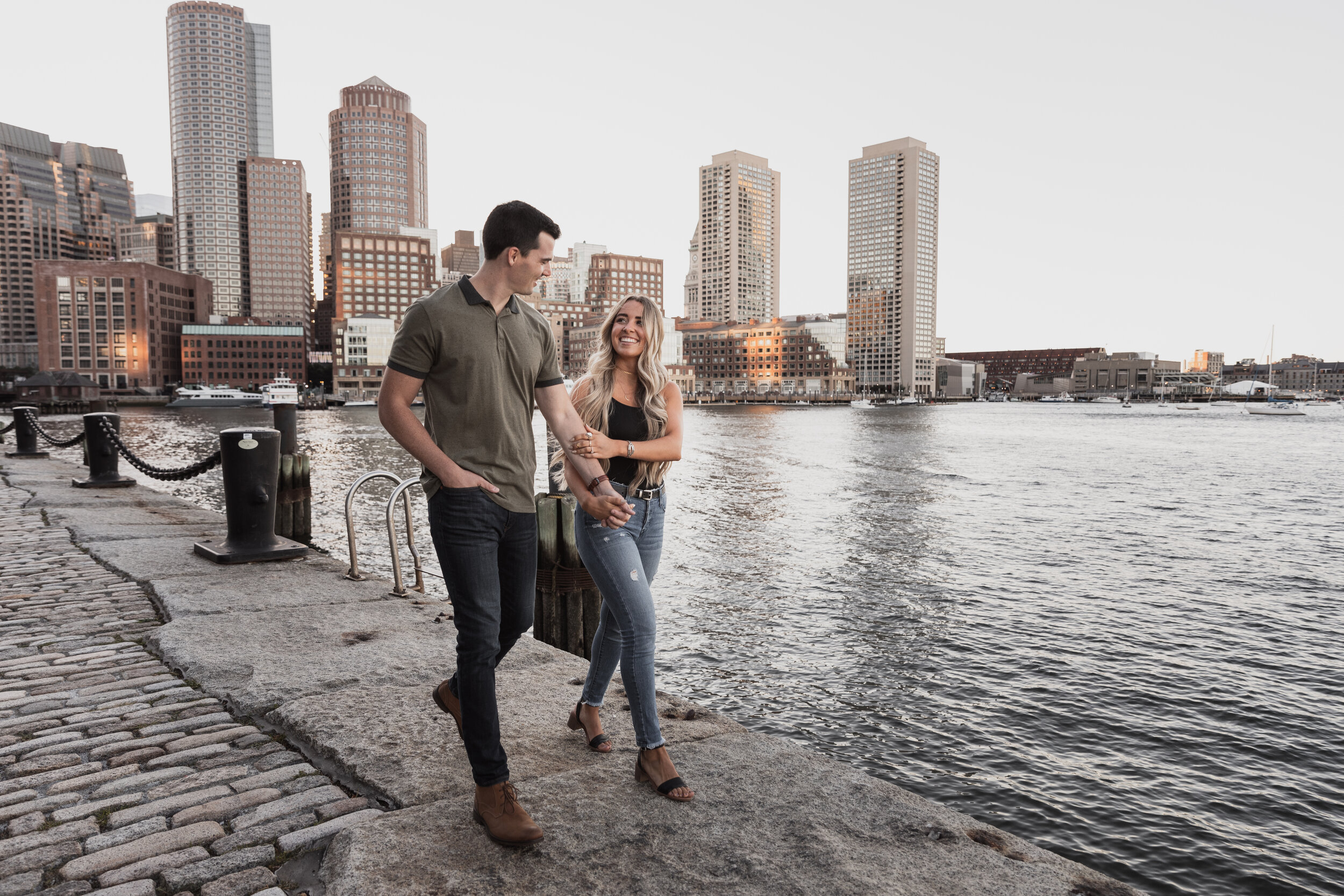 Boston Attorneys, Couple in Boston walking in seaport