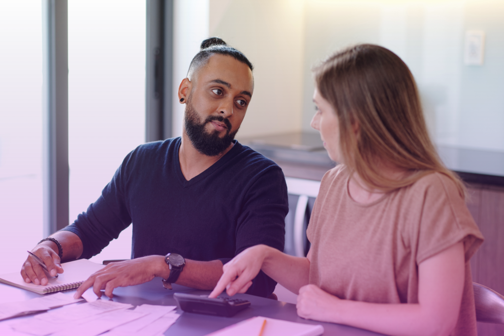 Couple reviewing their budget together