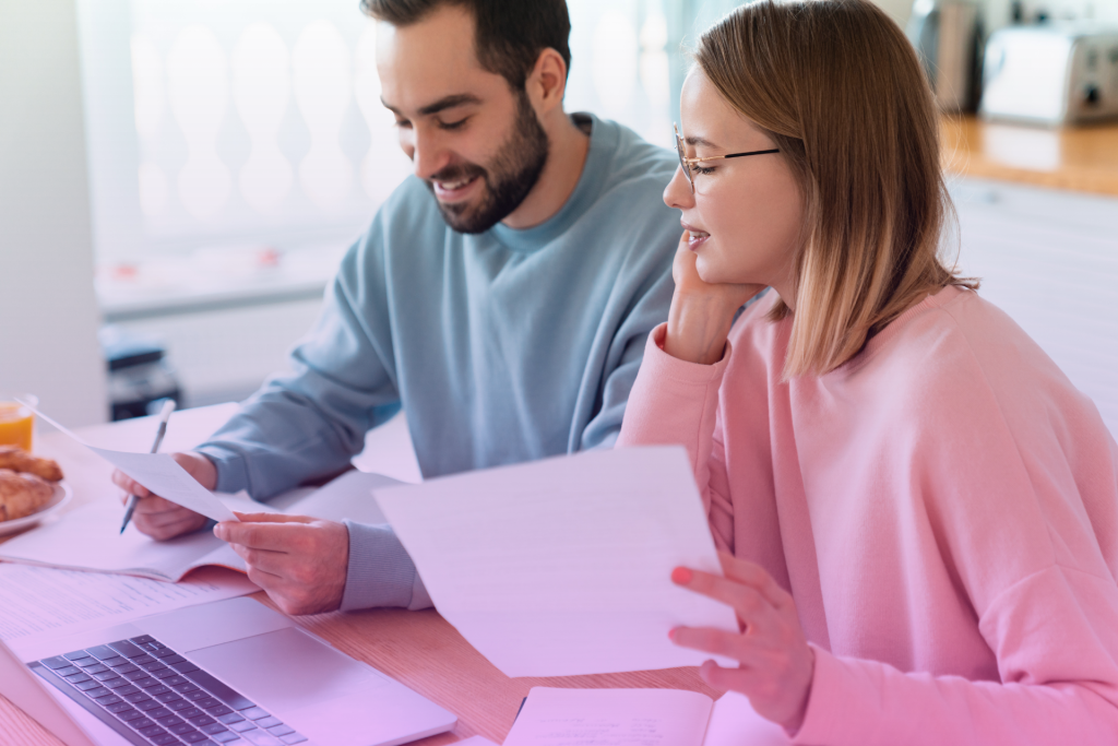 Couple meeting with a financial advisor to discuss their plans