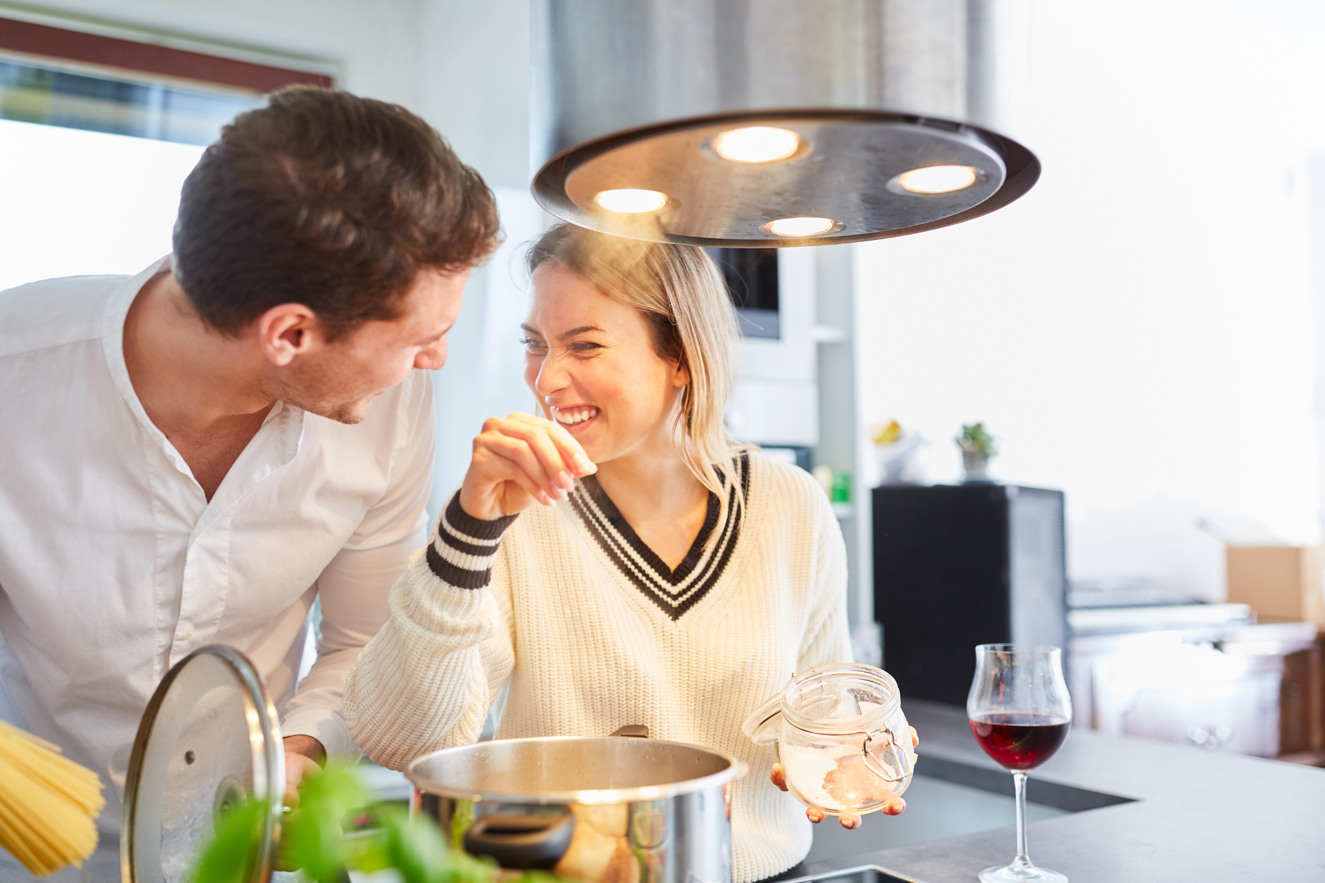 Couple cooking and laughing together in Mississippi
