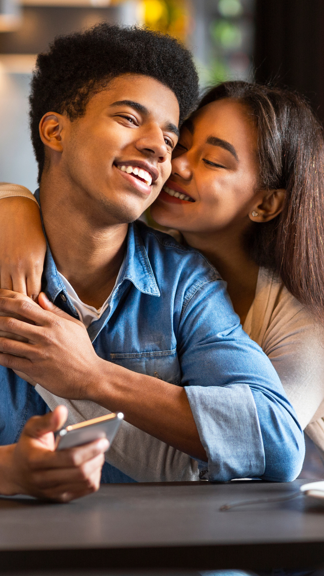 Couple laughing at a cafe in Oklahoma