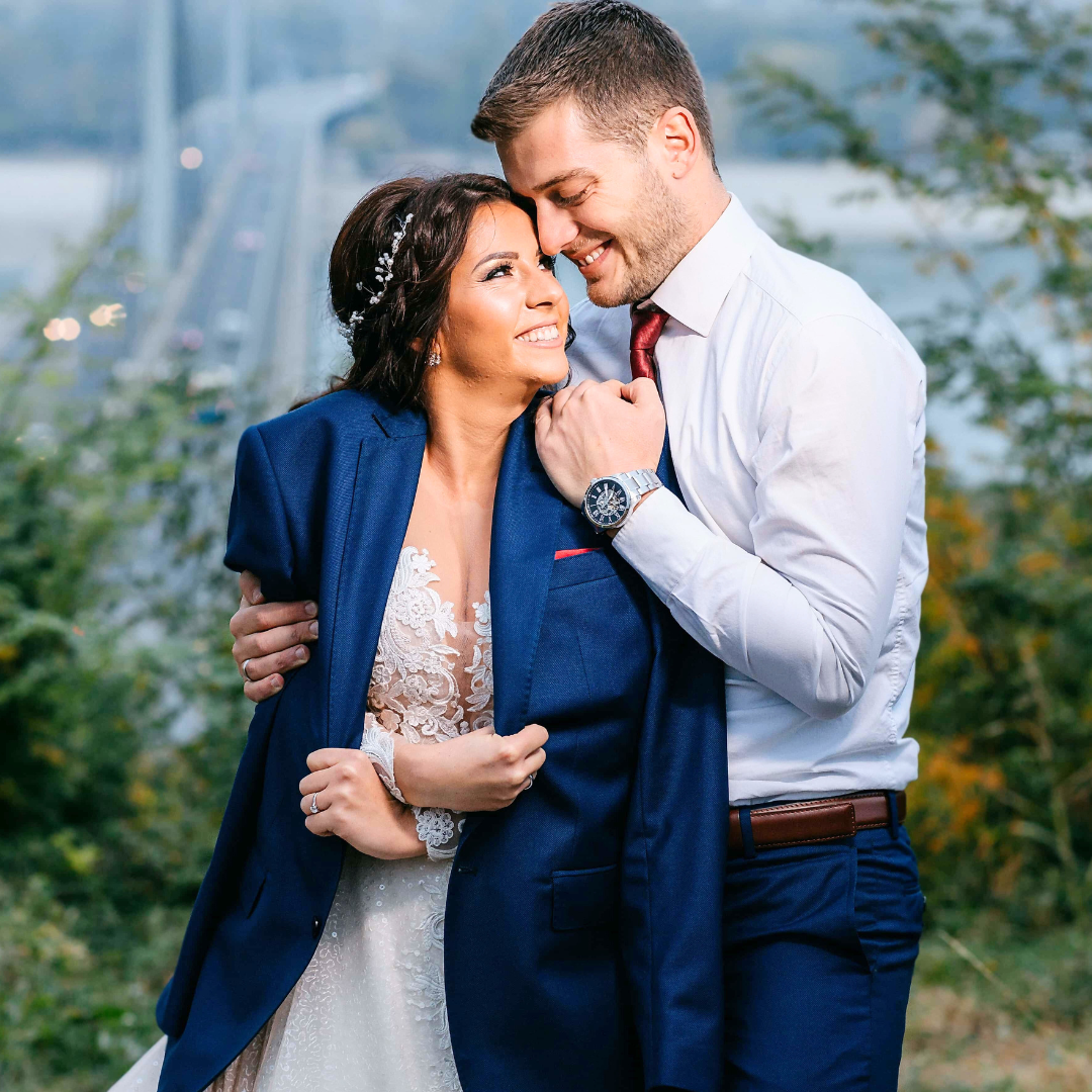 Groom gives his wife his jacket to protect her from the cold on their wedding day in Oklahoma