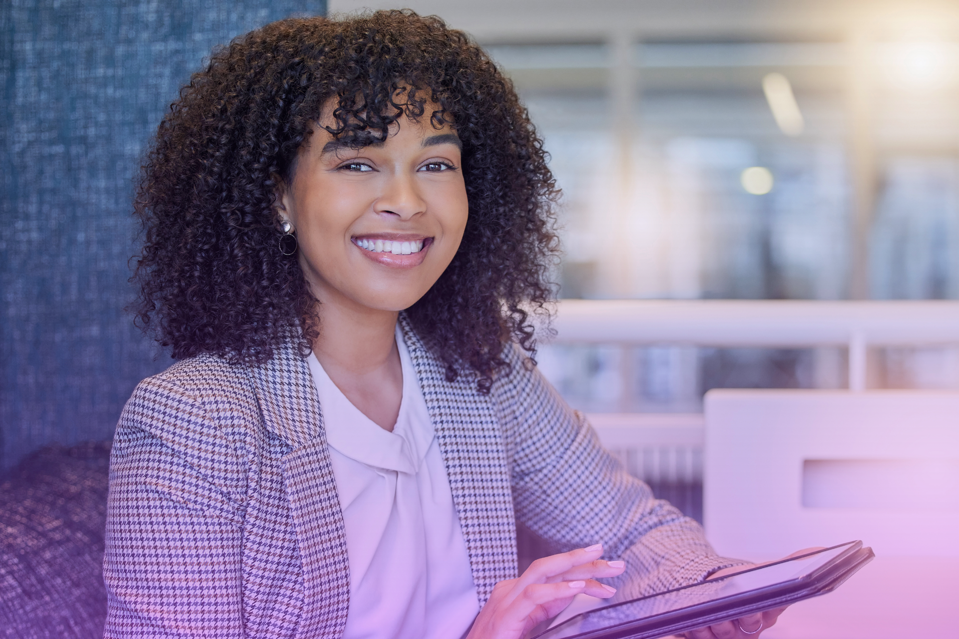 A person confidently reviewing financial charts and graphs on a laptop.