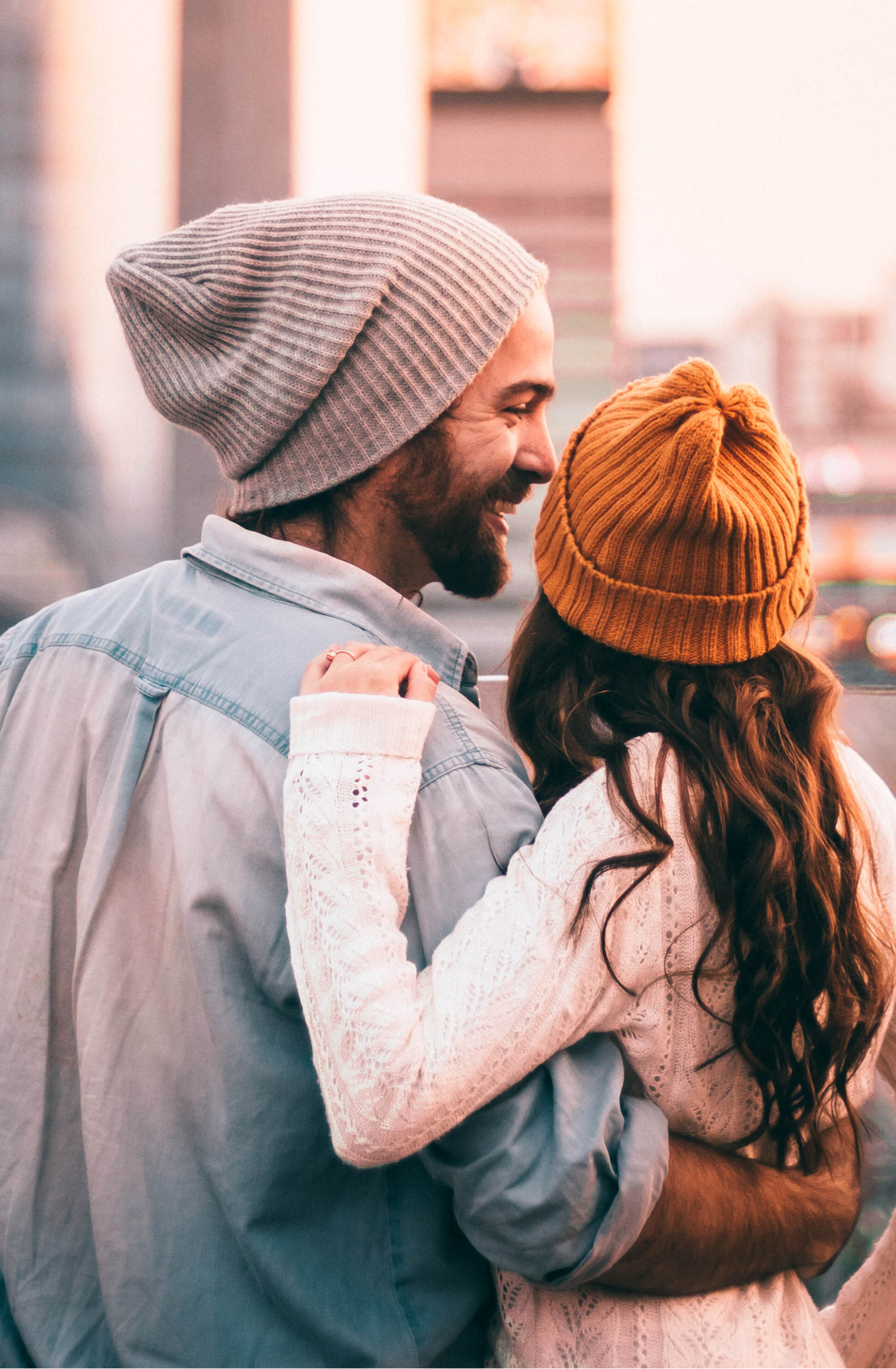 Couple watching the city at sunset in Oklahoma