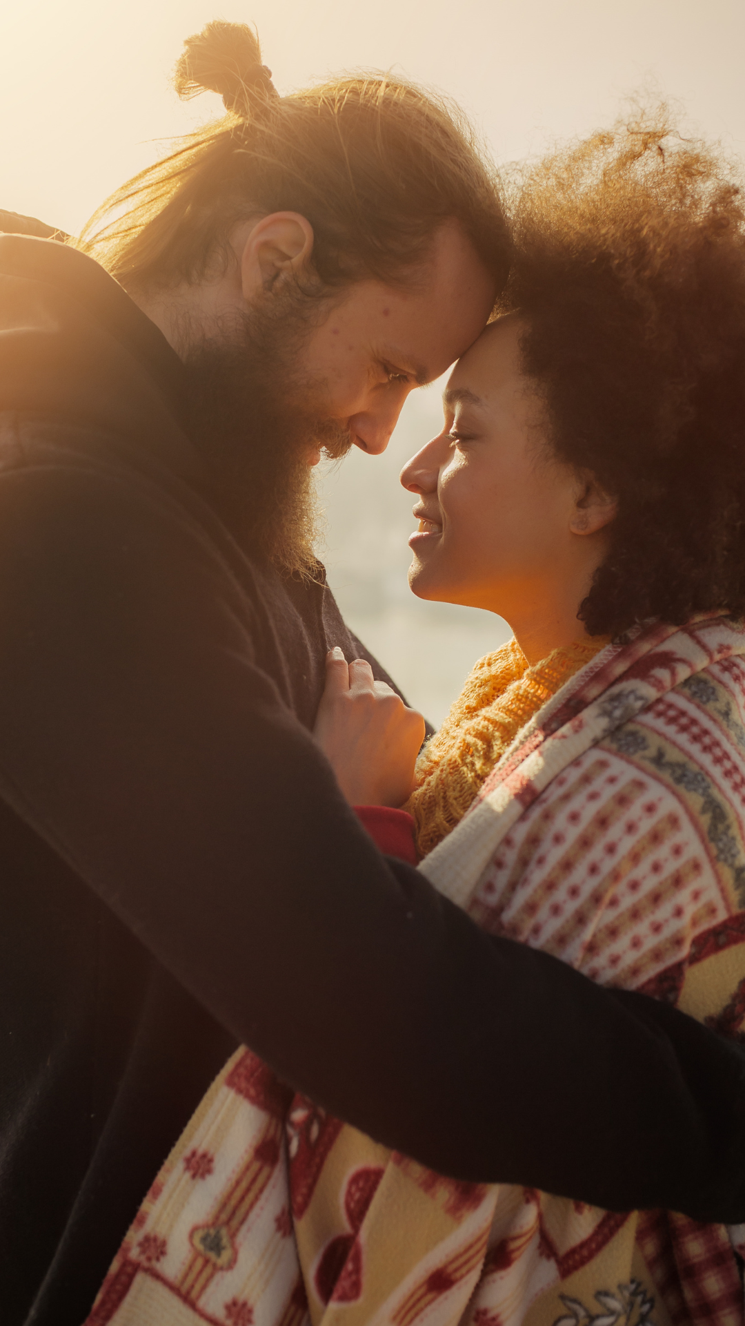 Couple smiling looking at each other in Vermont