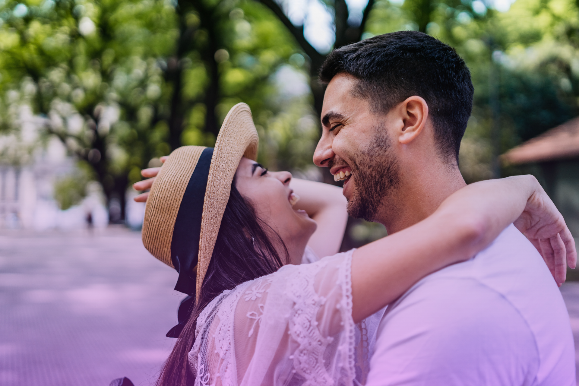 A happy couple shares a laugh while discussing their Kansas prenuptial agreement, highlighting the positive aspects of planning for their future together.