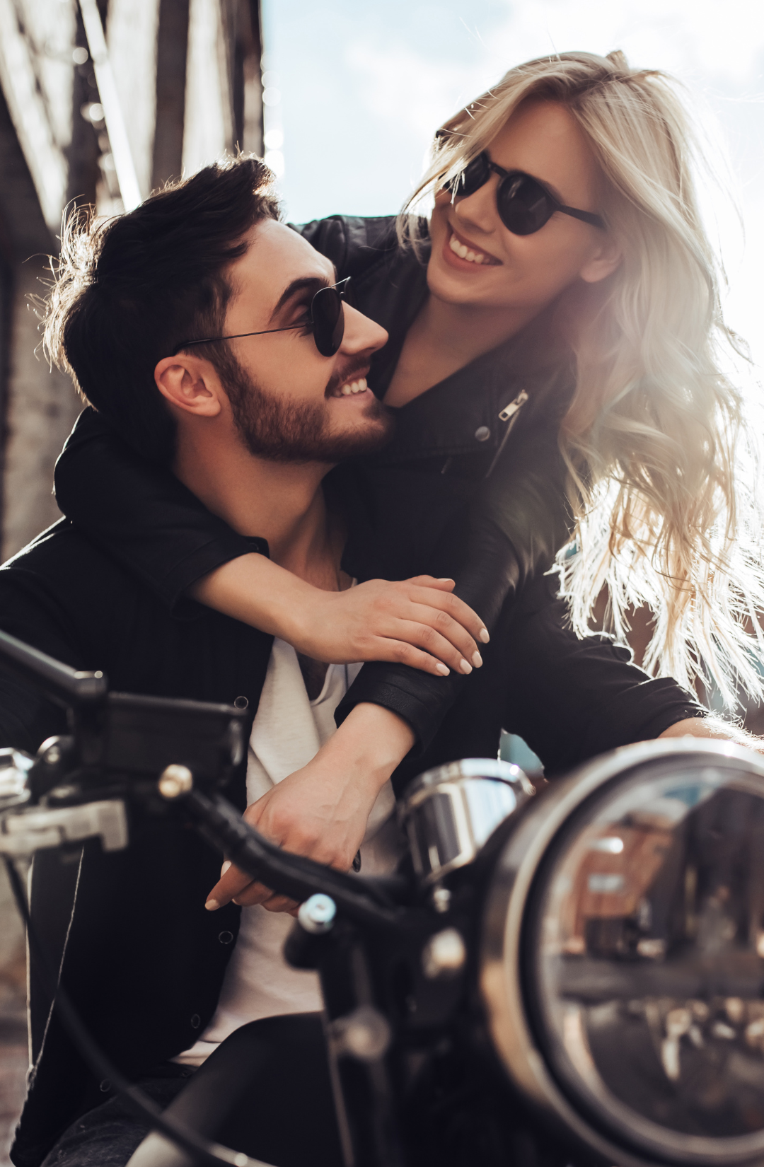 couple laughing on a motorcycle in South Dakota