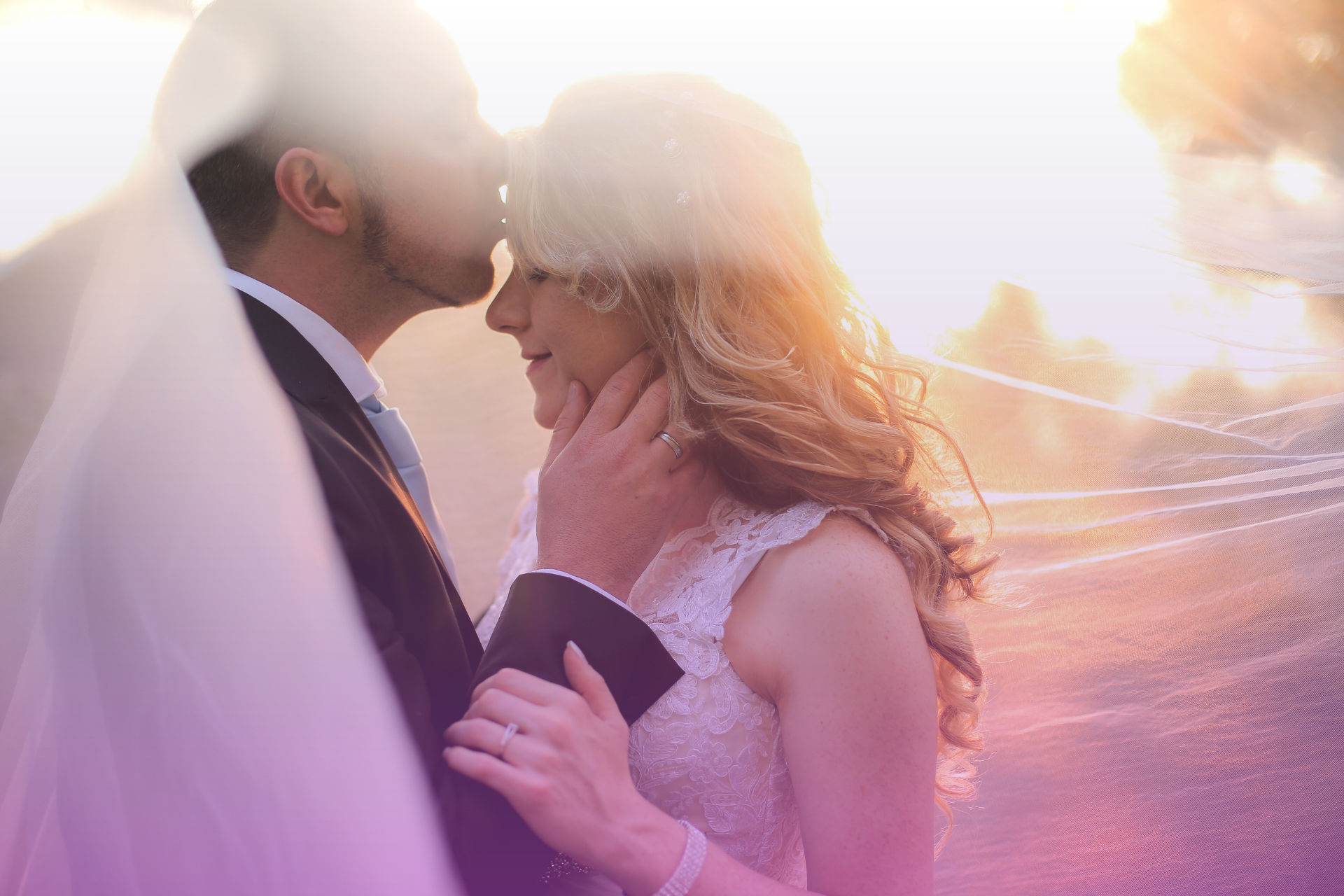 couple at their wedding looking at each other with love in Nebraska