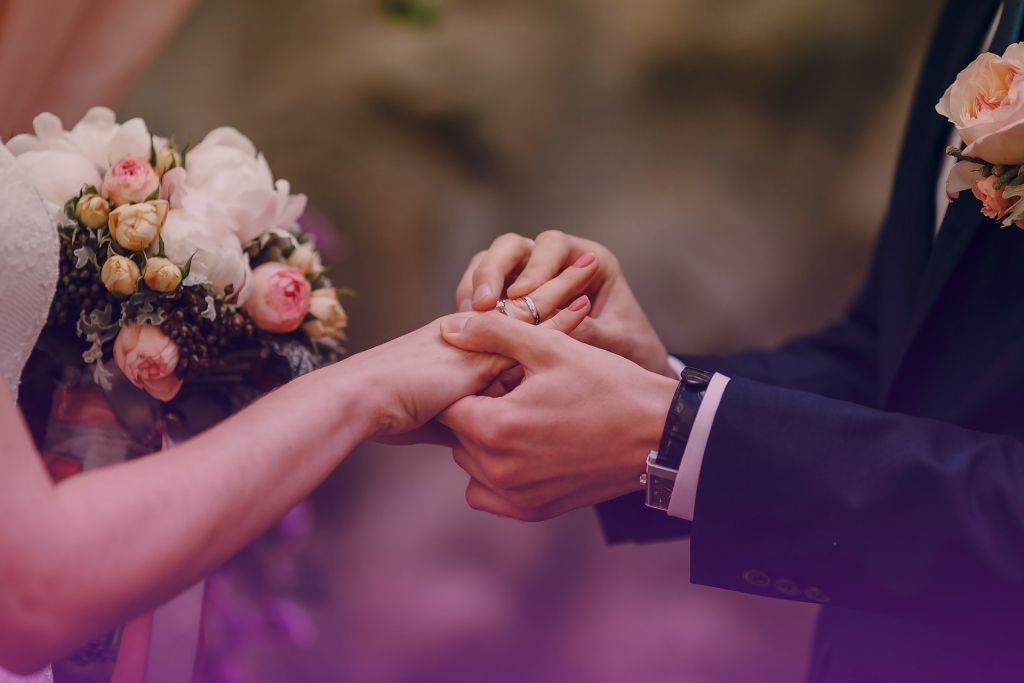 Two wedding rings intertwined, symbolizing marriage and planning for the future.