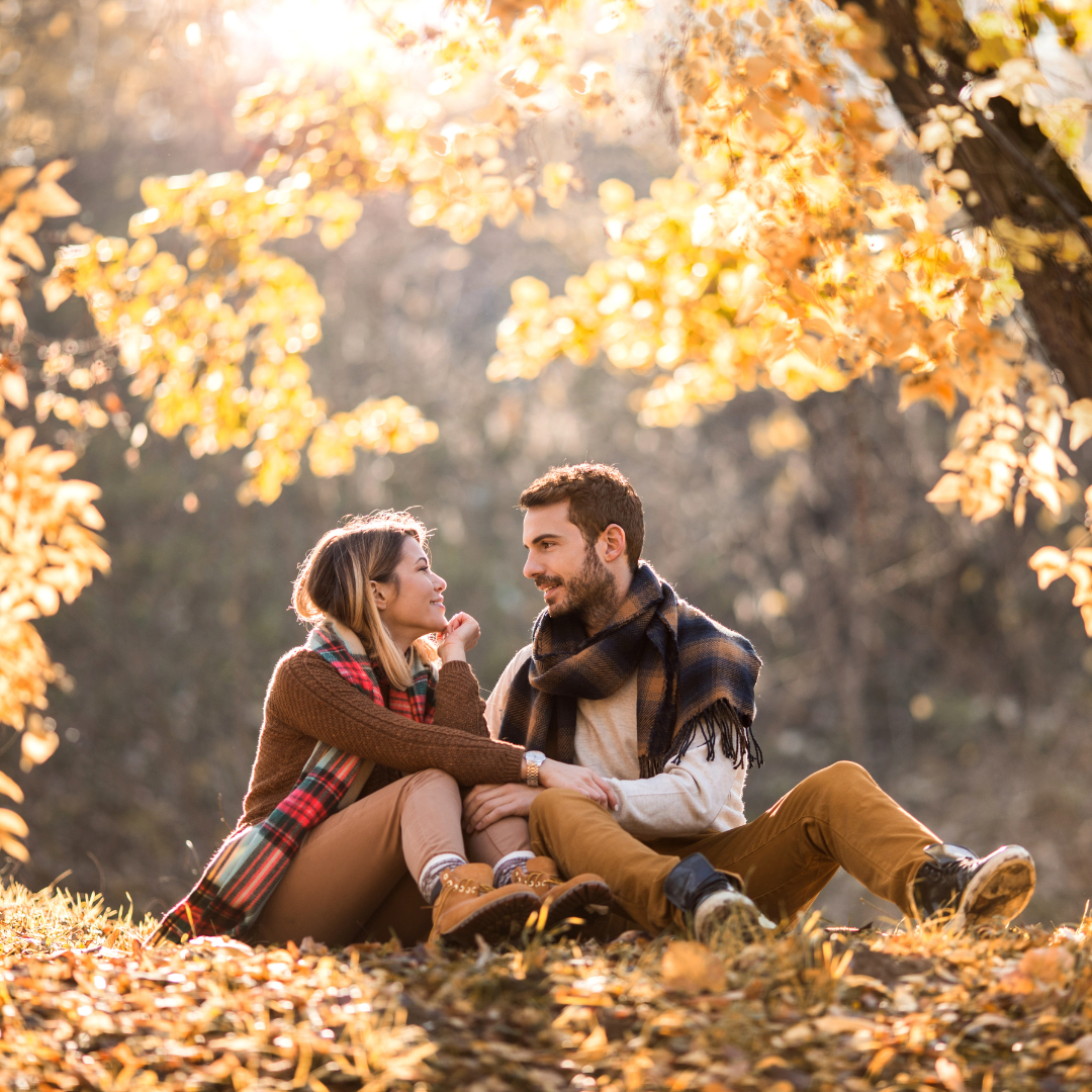 couple looking each other in the eyes on a sunny day in Iowa
