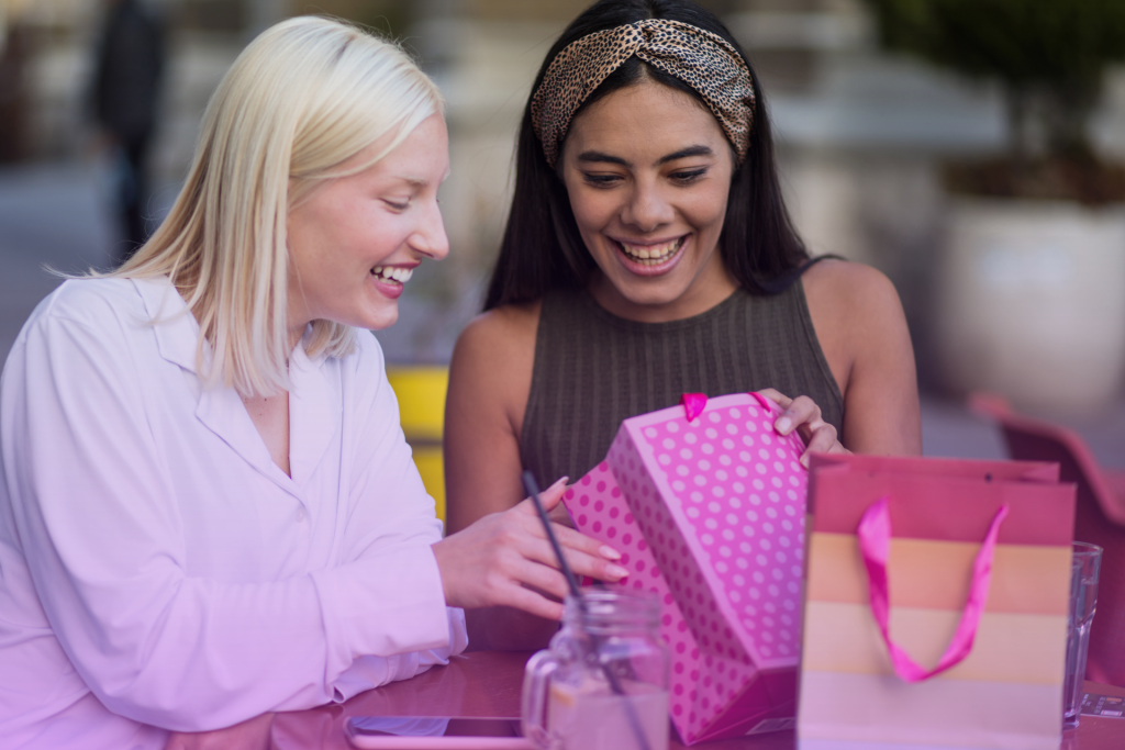 Group of friends raising a toast at a wedding reception, celebrating the newlyweds.