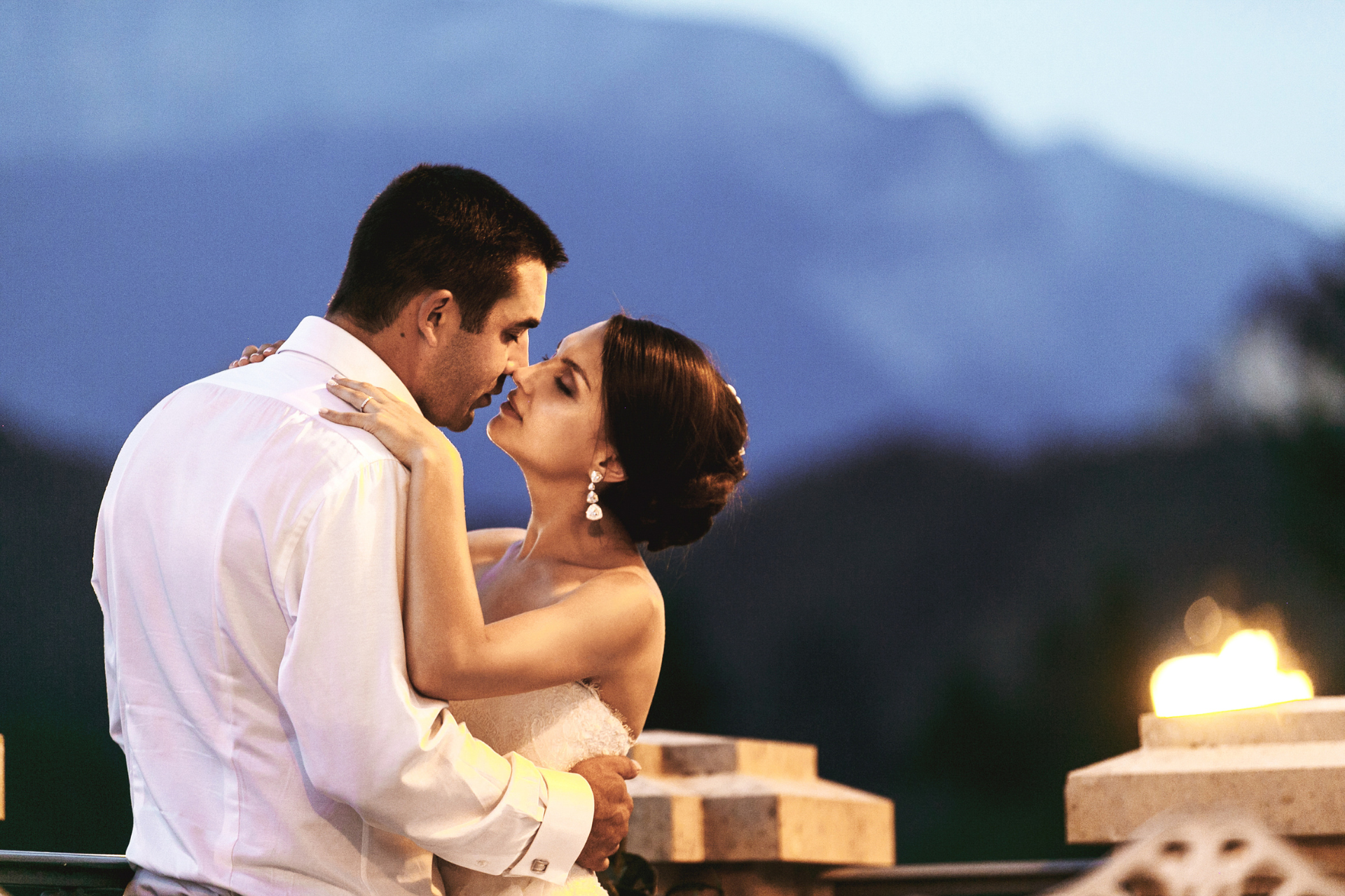 loving kiss of Latin couple at their wedding in North Carolina