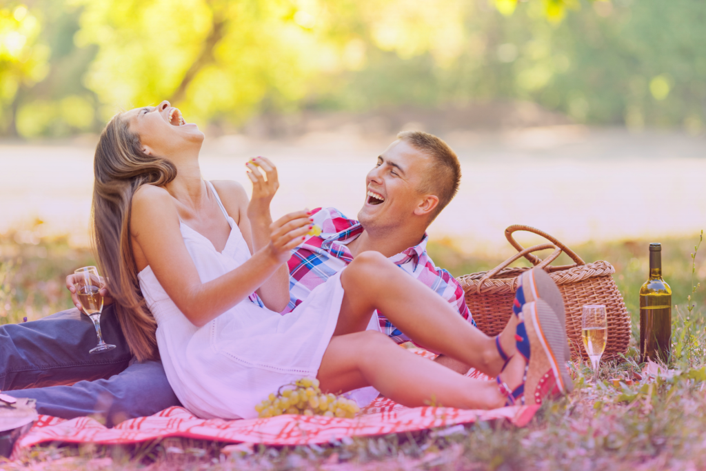 A thoughtful couple looking at each other while considering a prenuptial agreement.