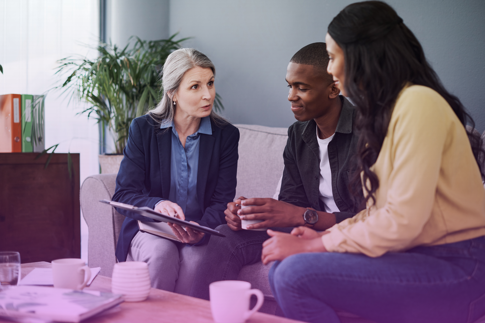 A person closely reviewing a postnuptial agreement document.