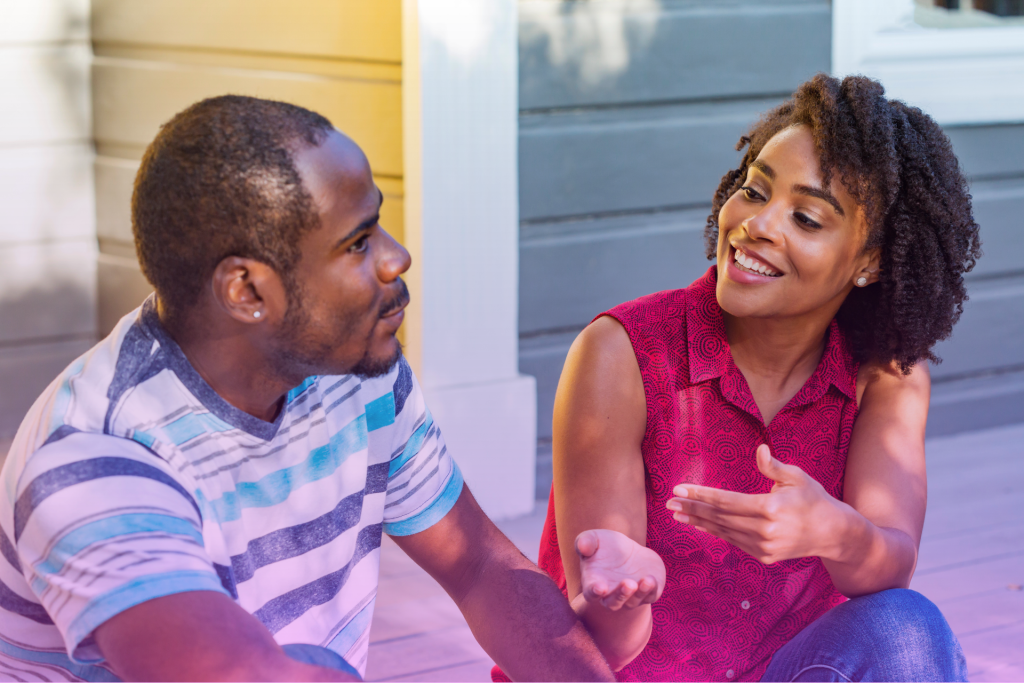  A couple talking openly and honestly with each other, symbolizing clear communication about finances.