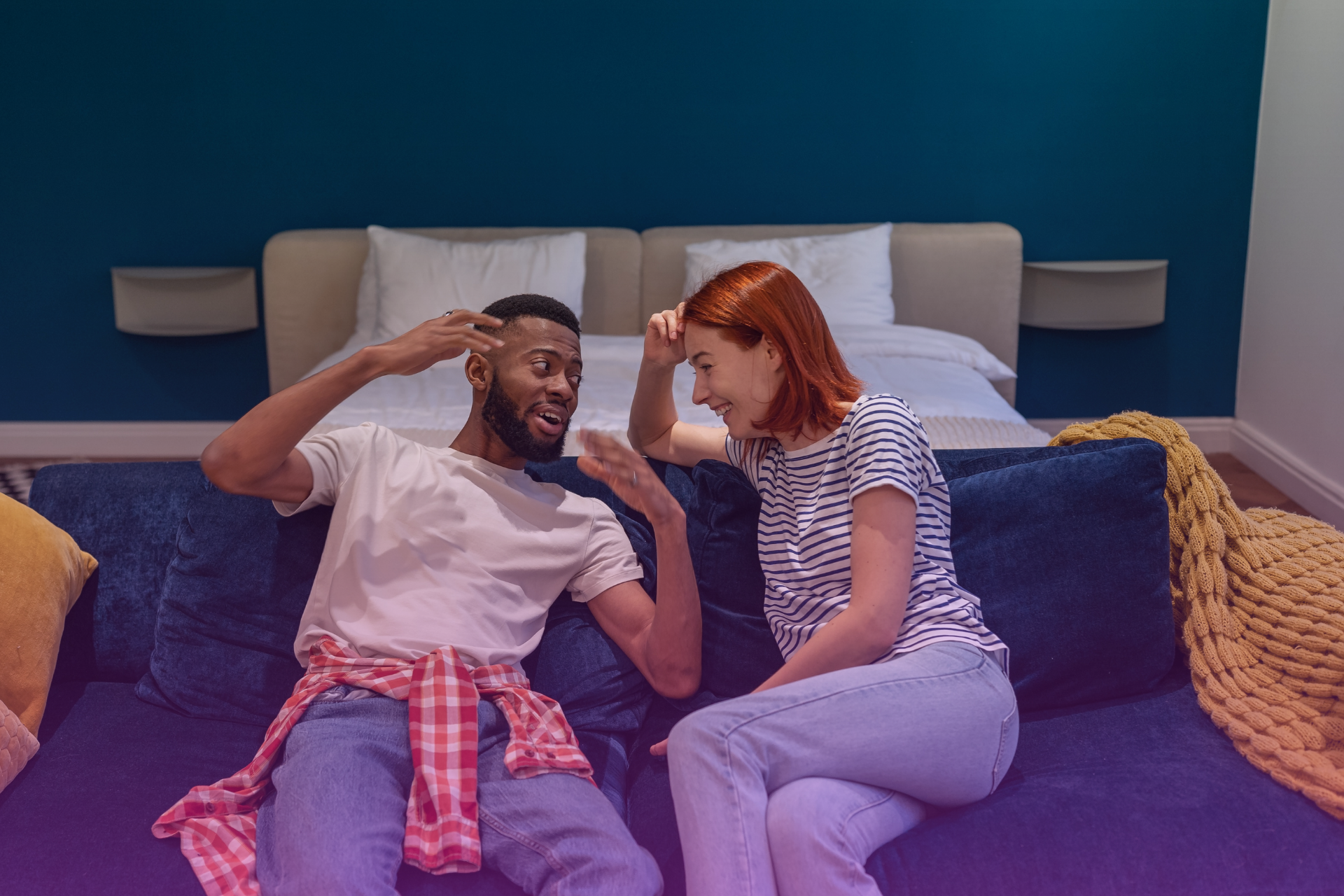  Two young professionals in Ontario discuss a prenuptial agreement with a serious but optimistic expression