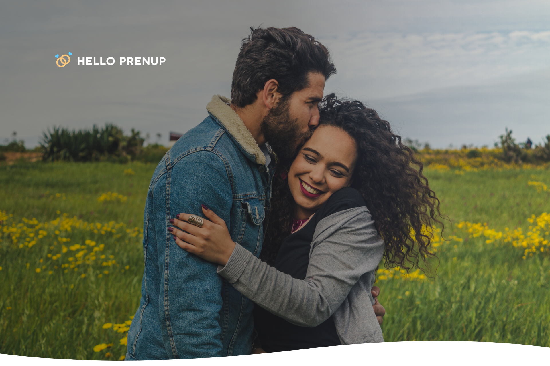 A couple celebrating their wedding anniversary with a cake and champagne.