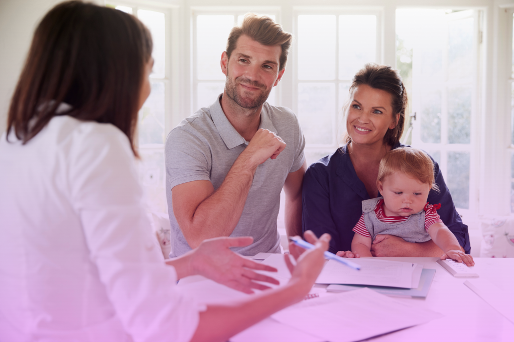 A family gathered together discussing estate planning documents.