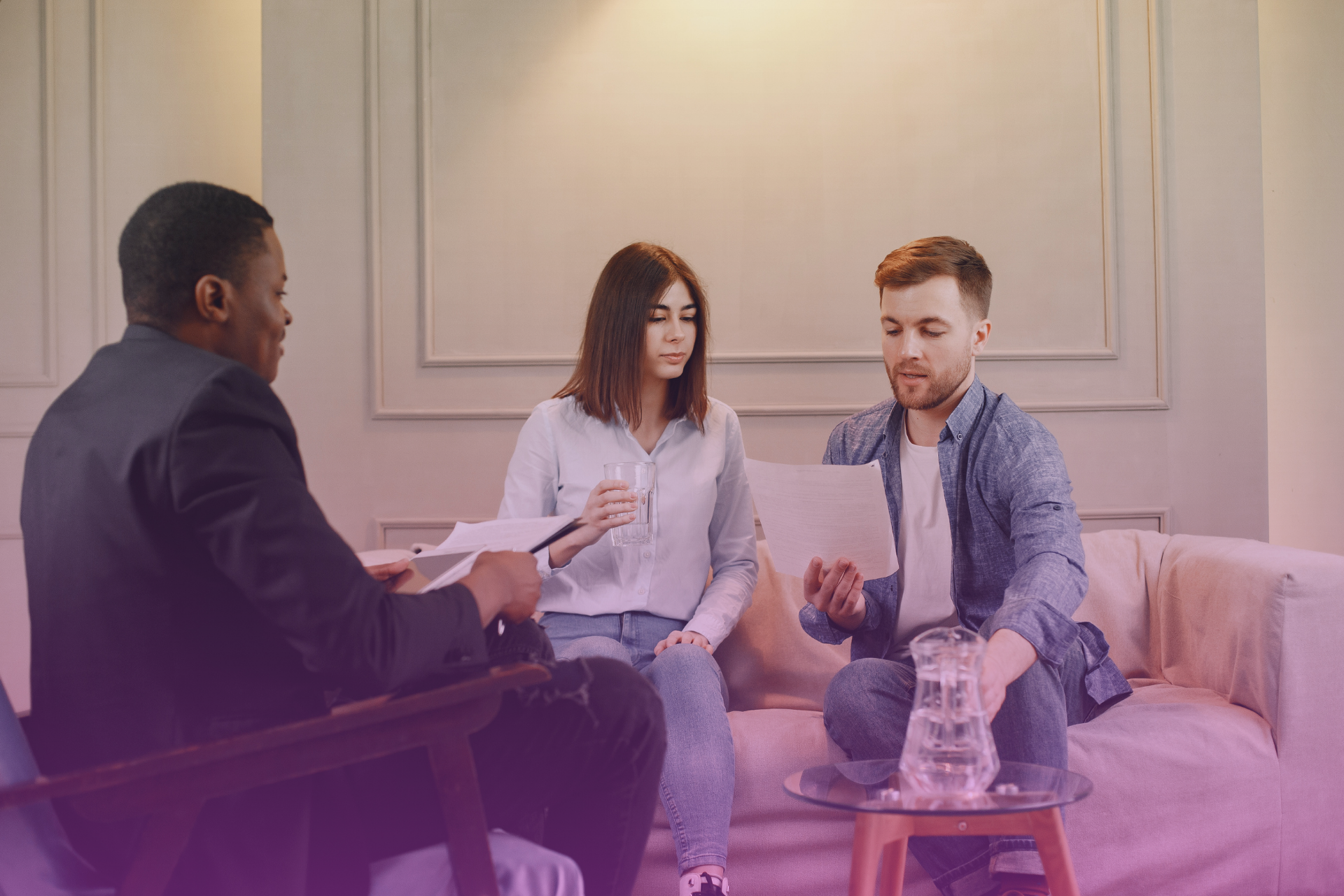 A lawyer explaining will and beneficiary details to a family