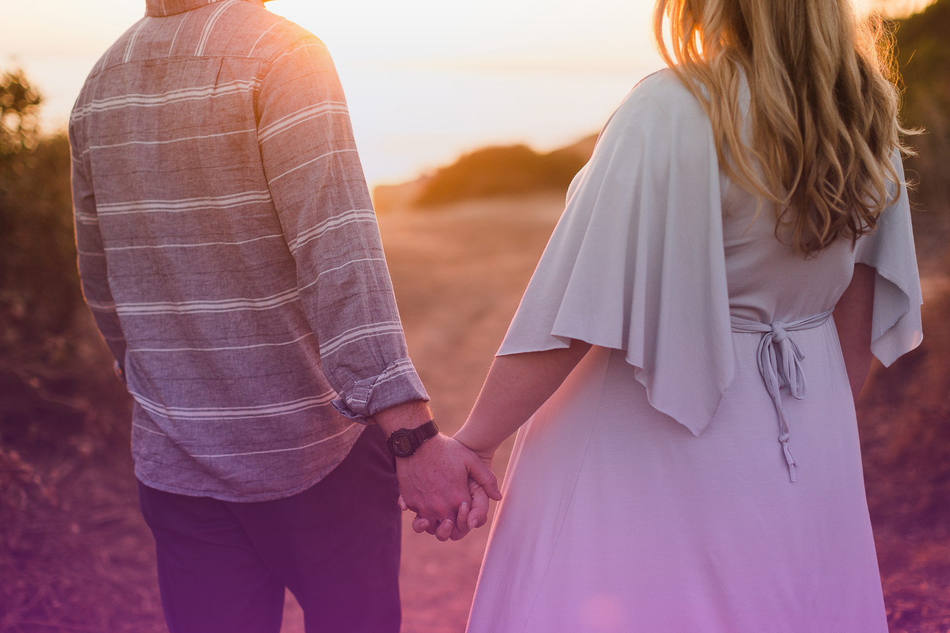 A couple holding hands while making an IVF-related decision