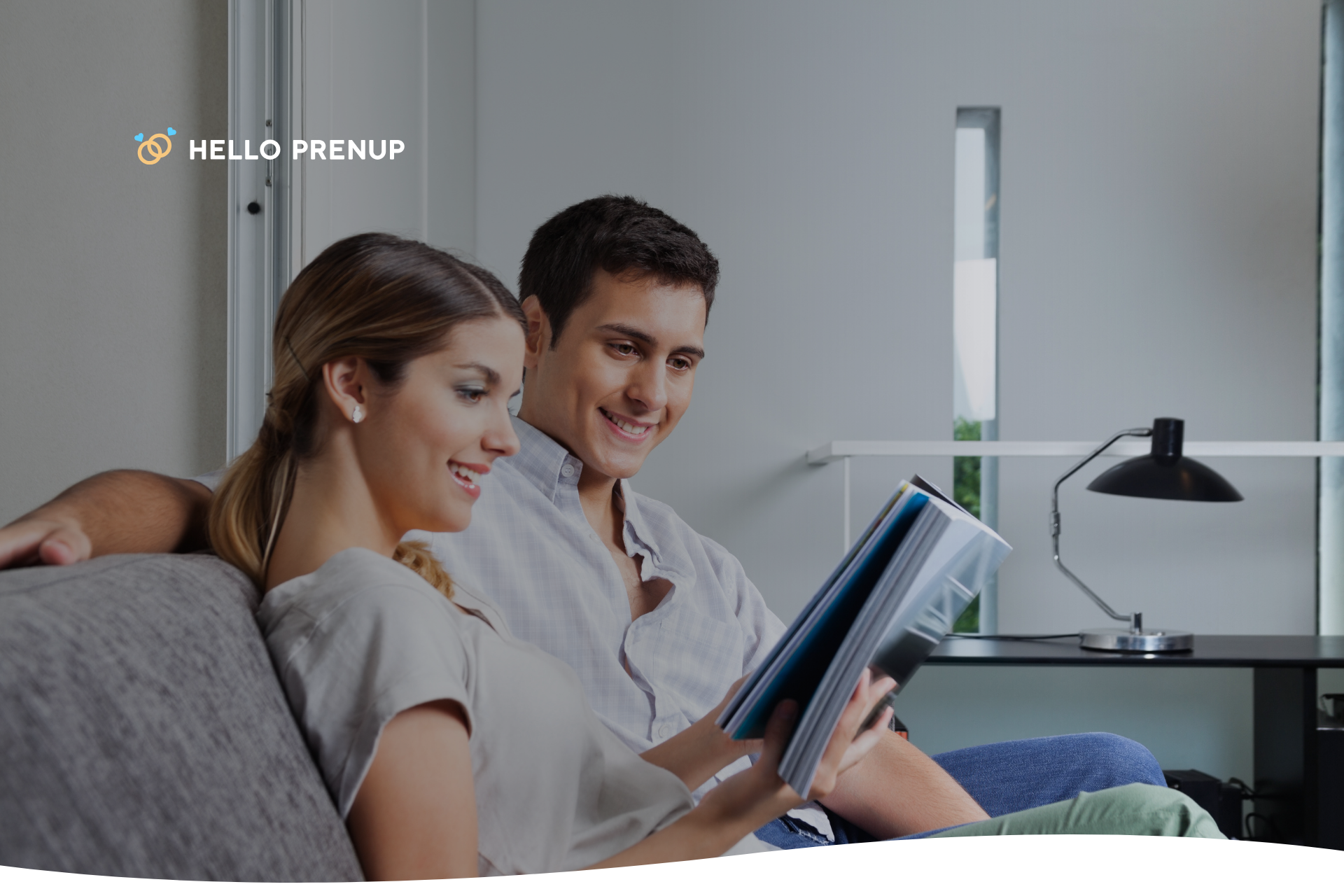 couple_reviewing_prenup_missouri A couple discussing financial planning before marriage