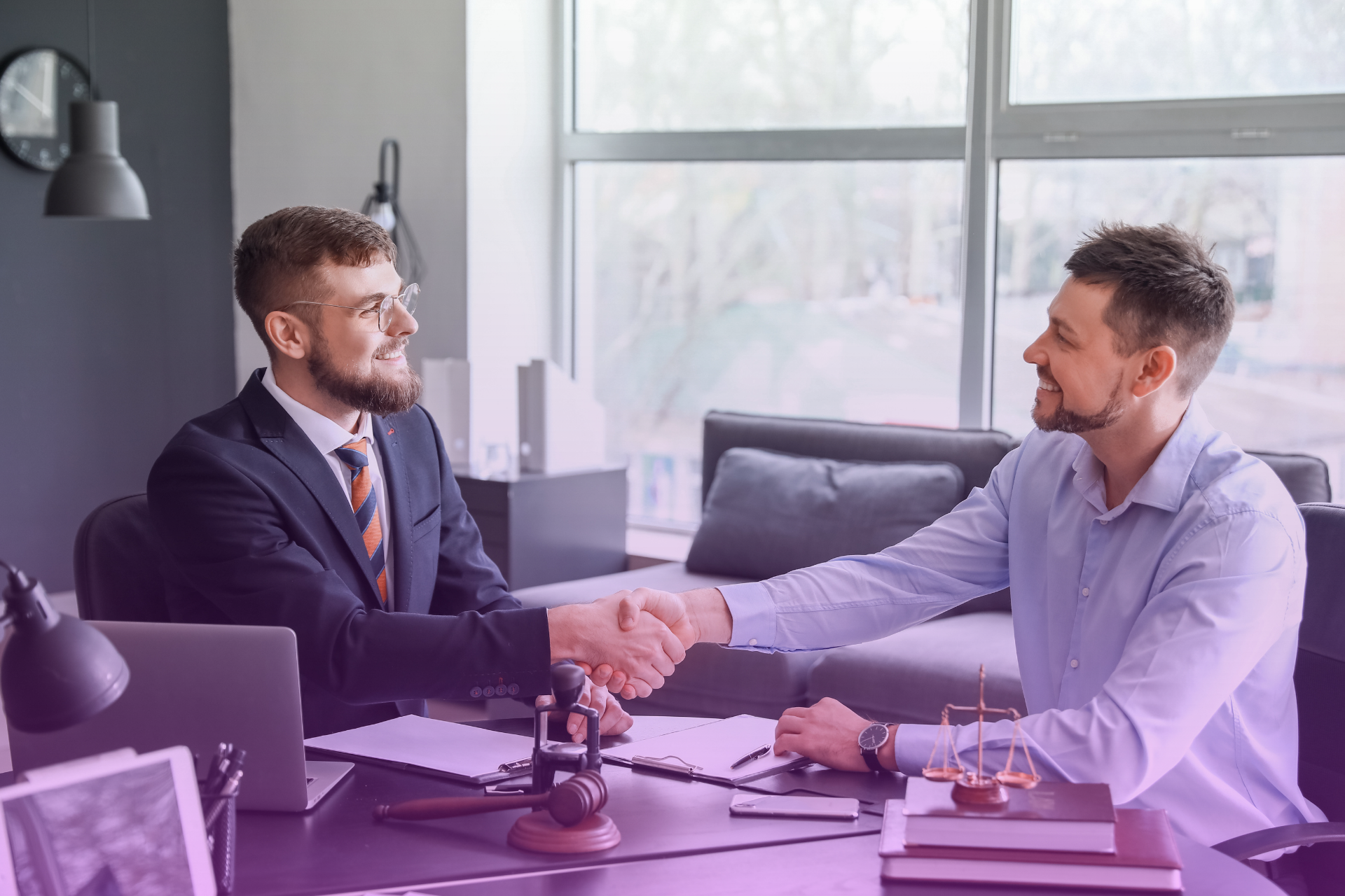 A lawyer explaining Iowa prenup laws to a couple
