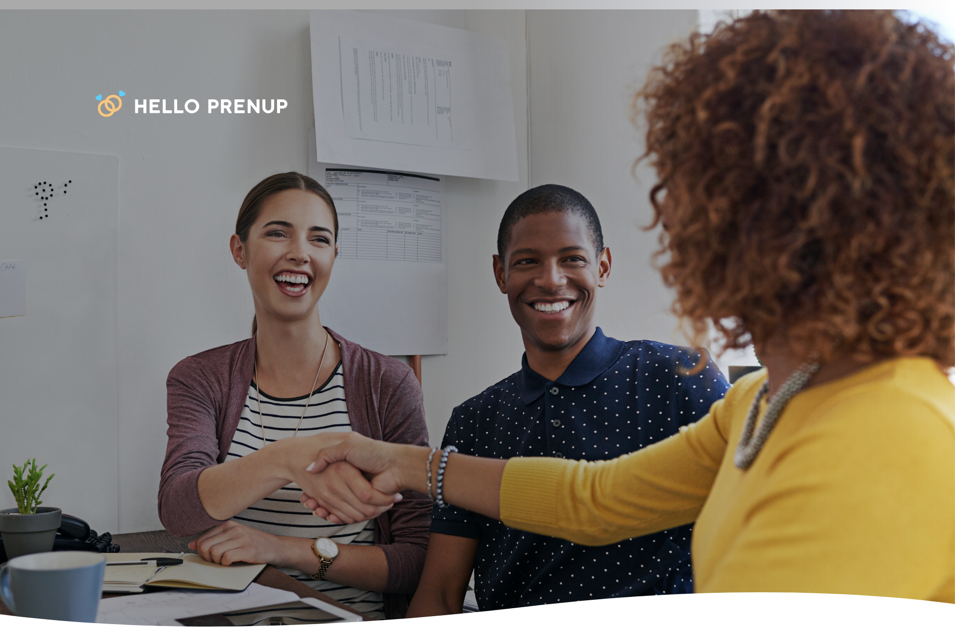 A couple reviewing a postnuptial agreement contract