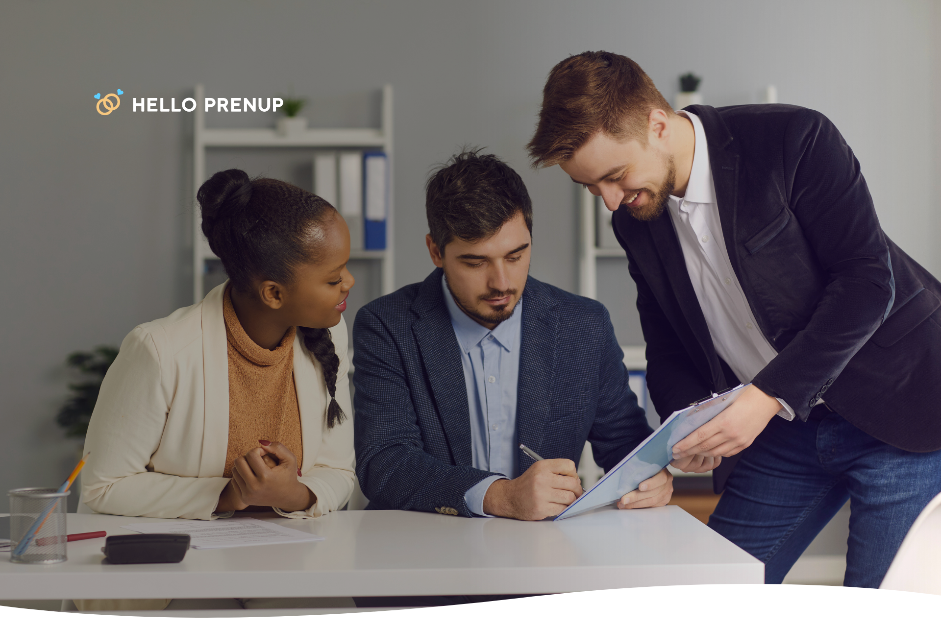 A couple signing a prenuptial agreement in Iowa