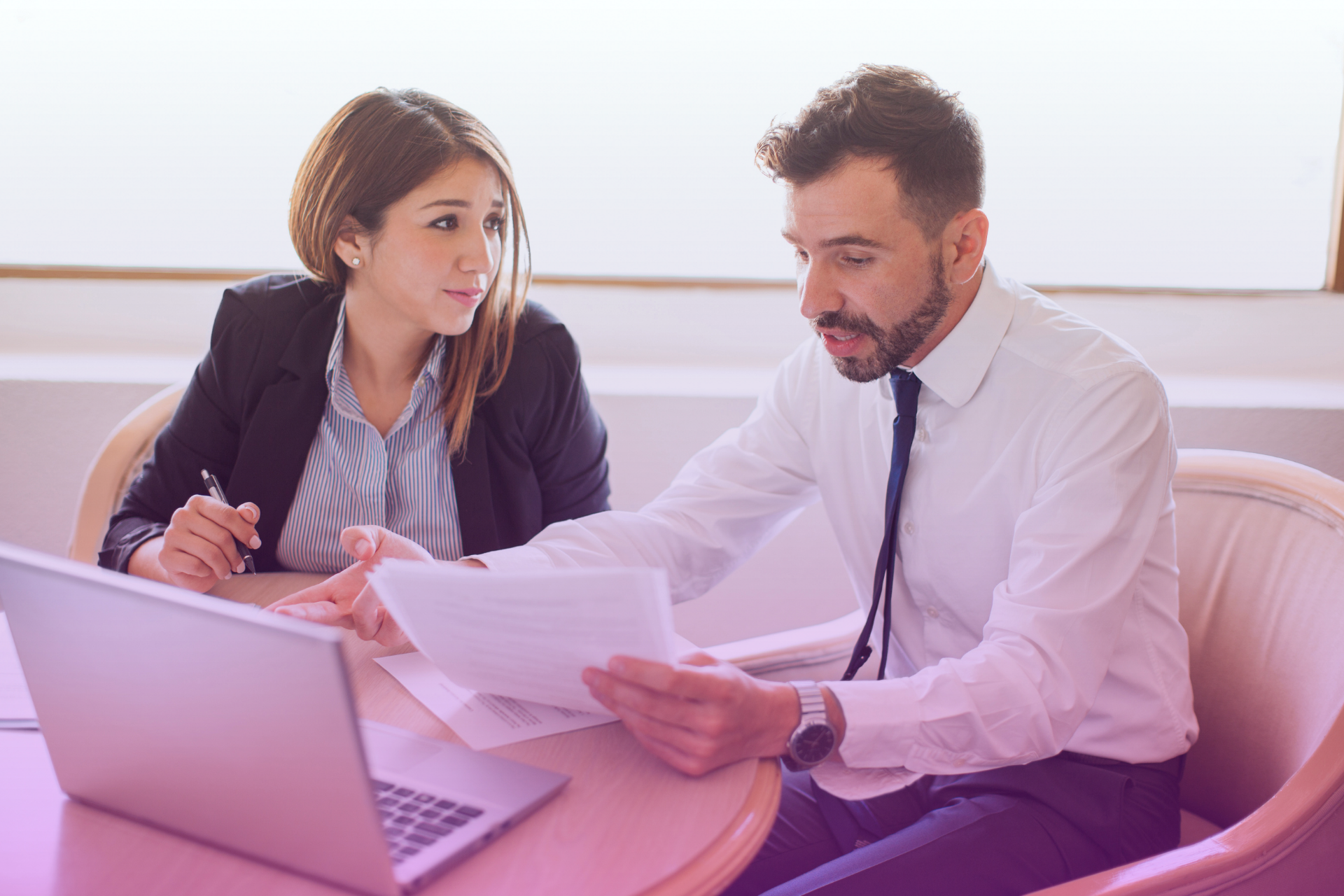 Everyday couple consulting a lawyer about a postnuptial agreement