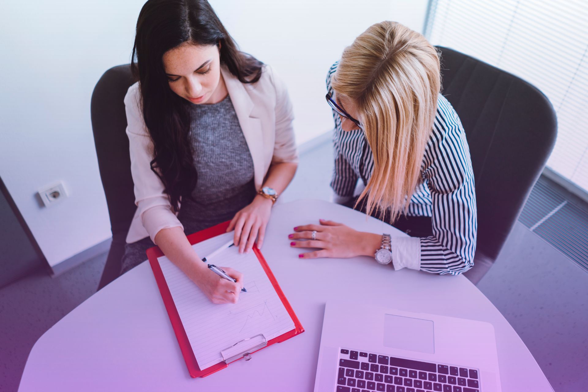 Lawyer explaining postnup clauses about spousal rights to a client