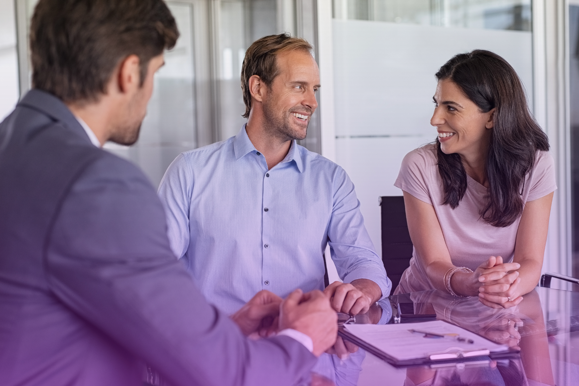 Married couple meeting with estate lawyer to plan their future