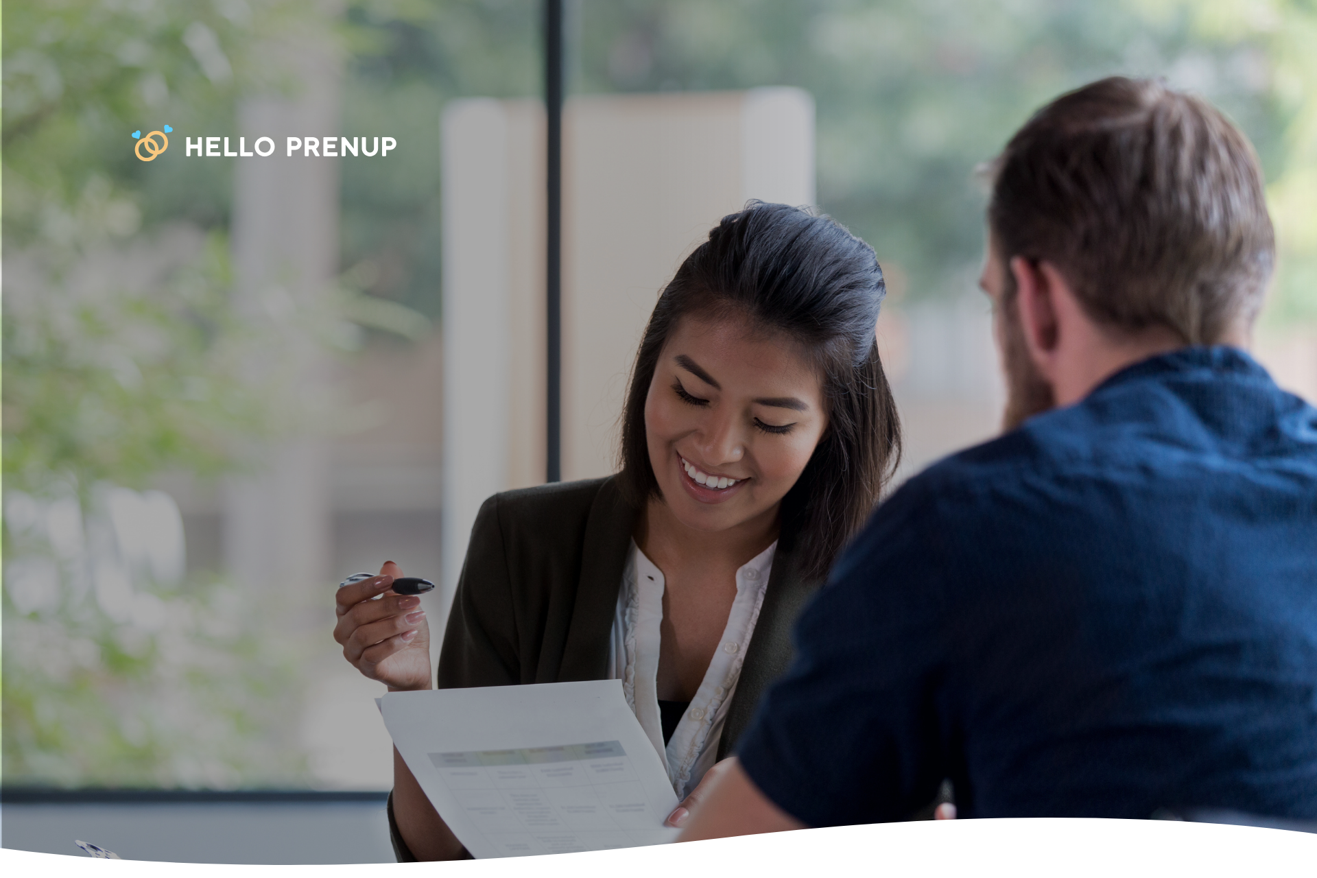 Married couple reviewing legal documents with an estate planning attorney