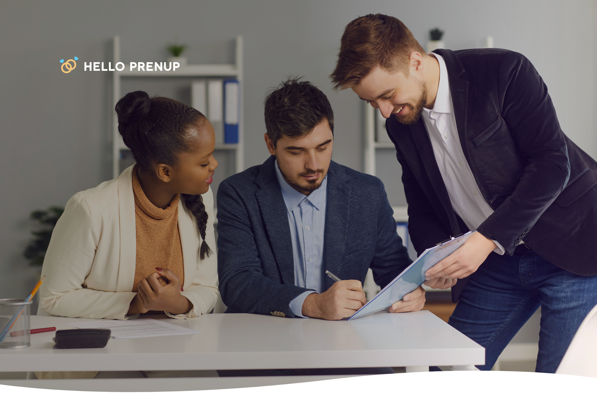 Married couple signing a postnuptial agreement together