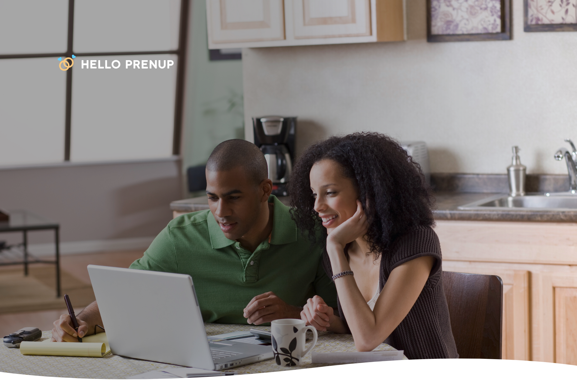 Couple using a computer to create a prenup with AI