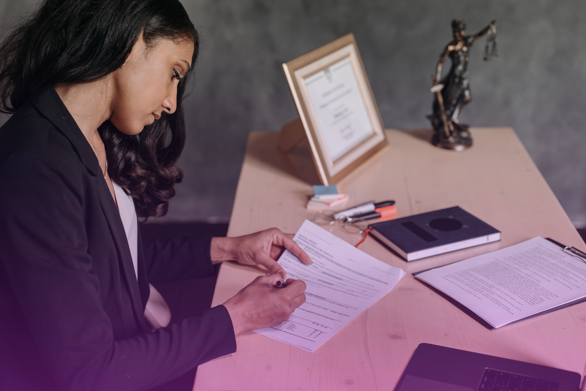 Attorney reviewing prenup documents with a couple in Georgia