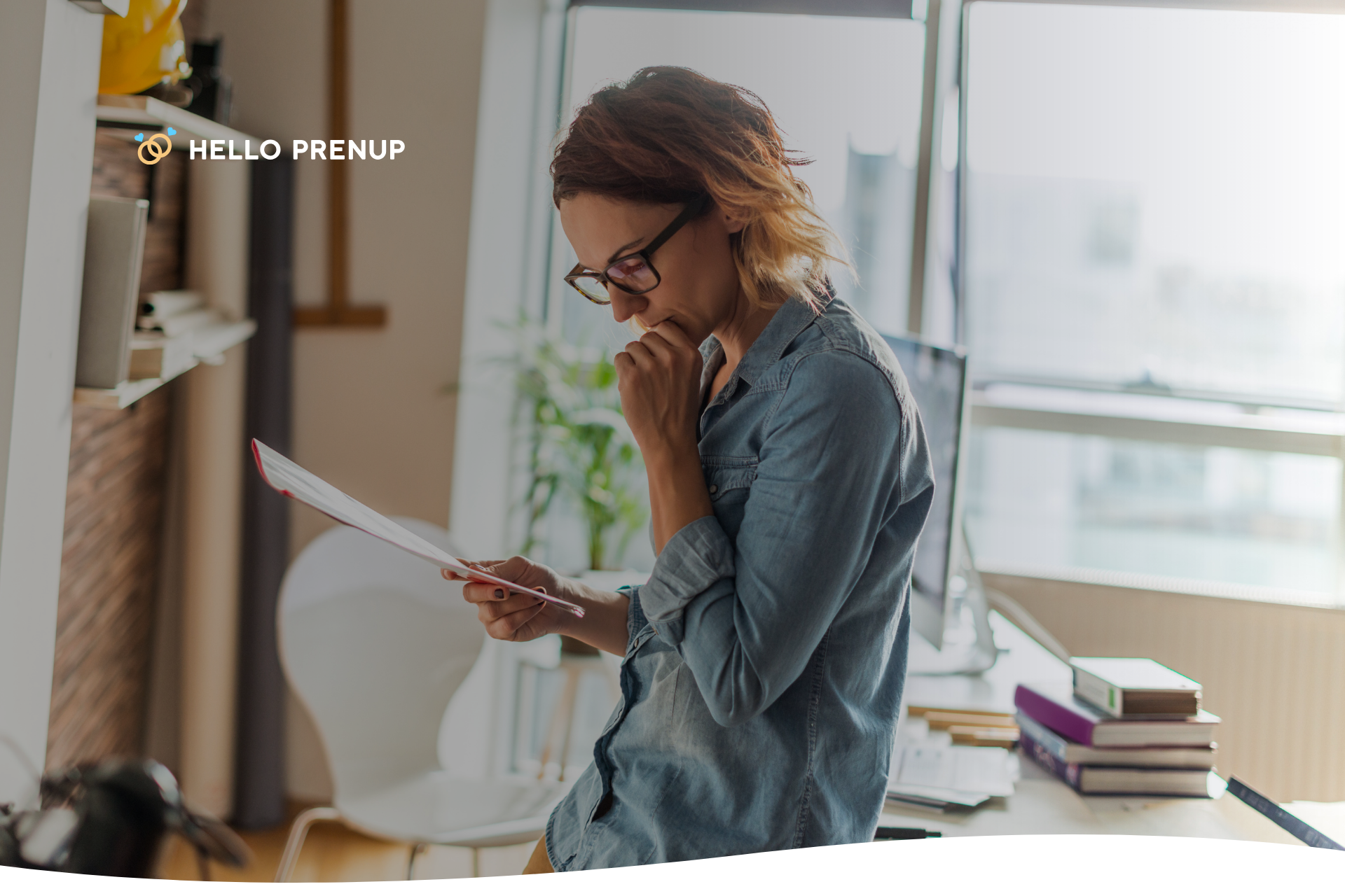 A person looking overwhelmed while reviewing legal documents