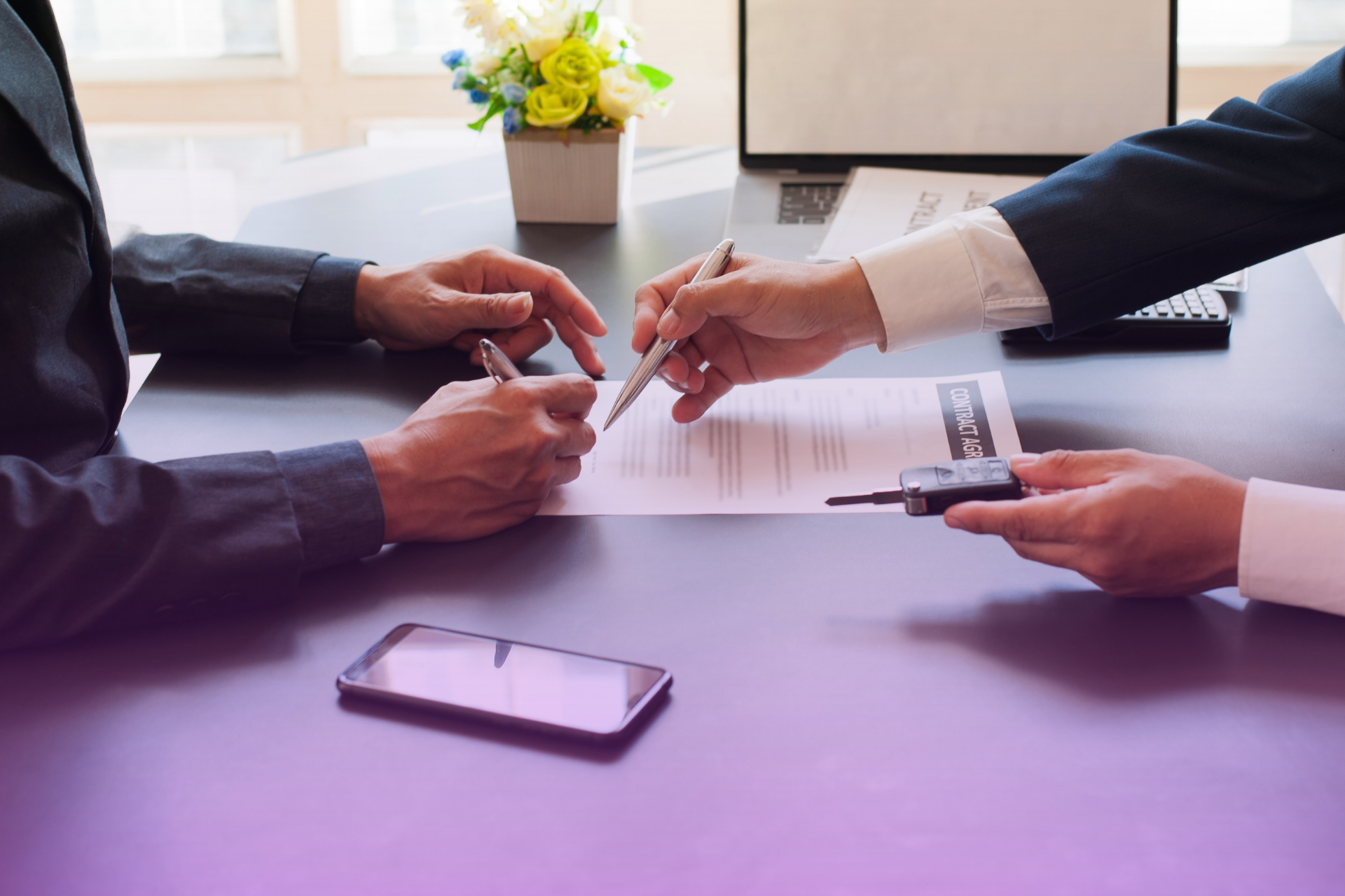 A prenup agreement with a Minnesota legal header being signed by two people
