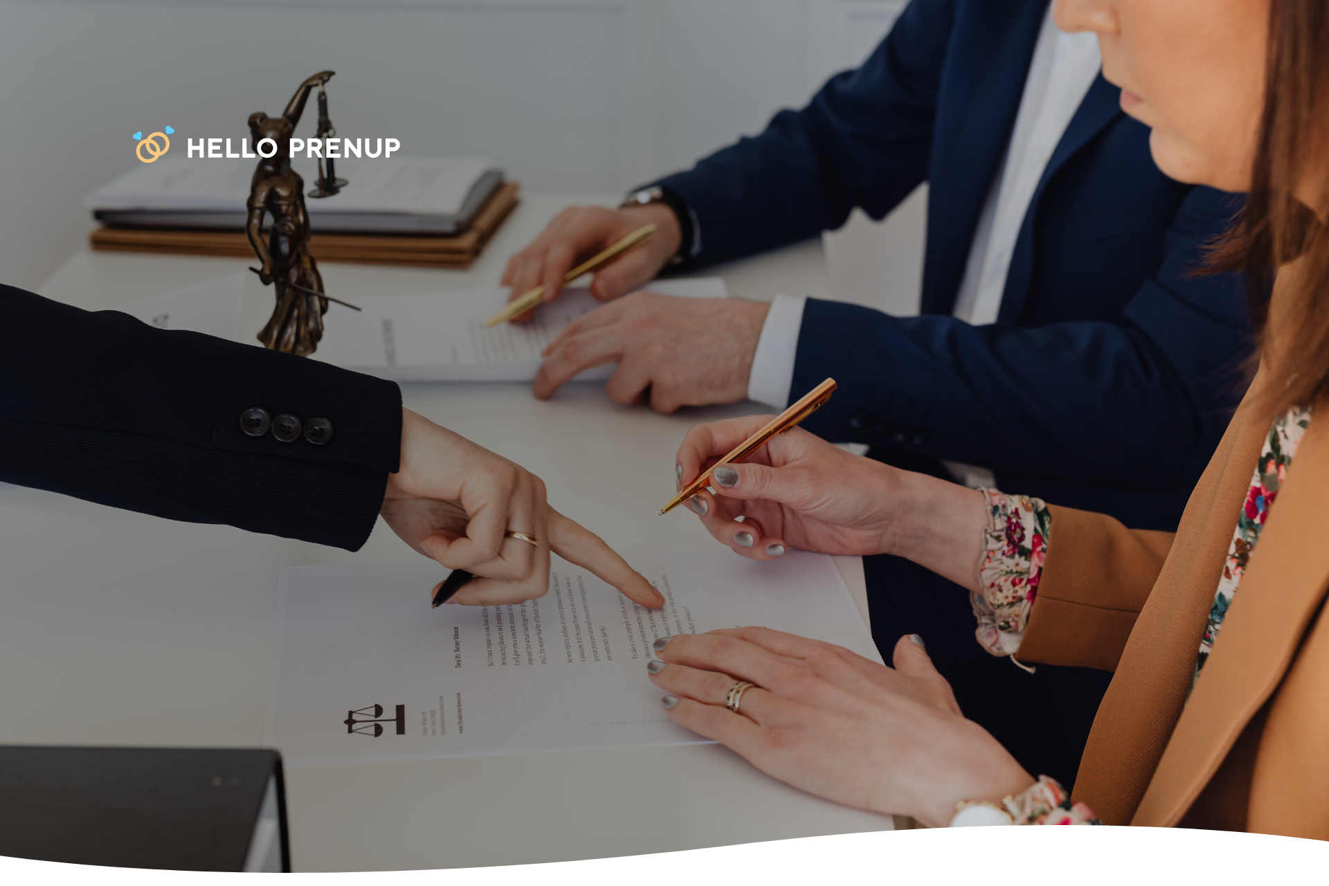 Elderly person signing will while two witnesses observe