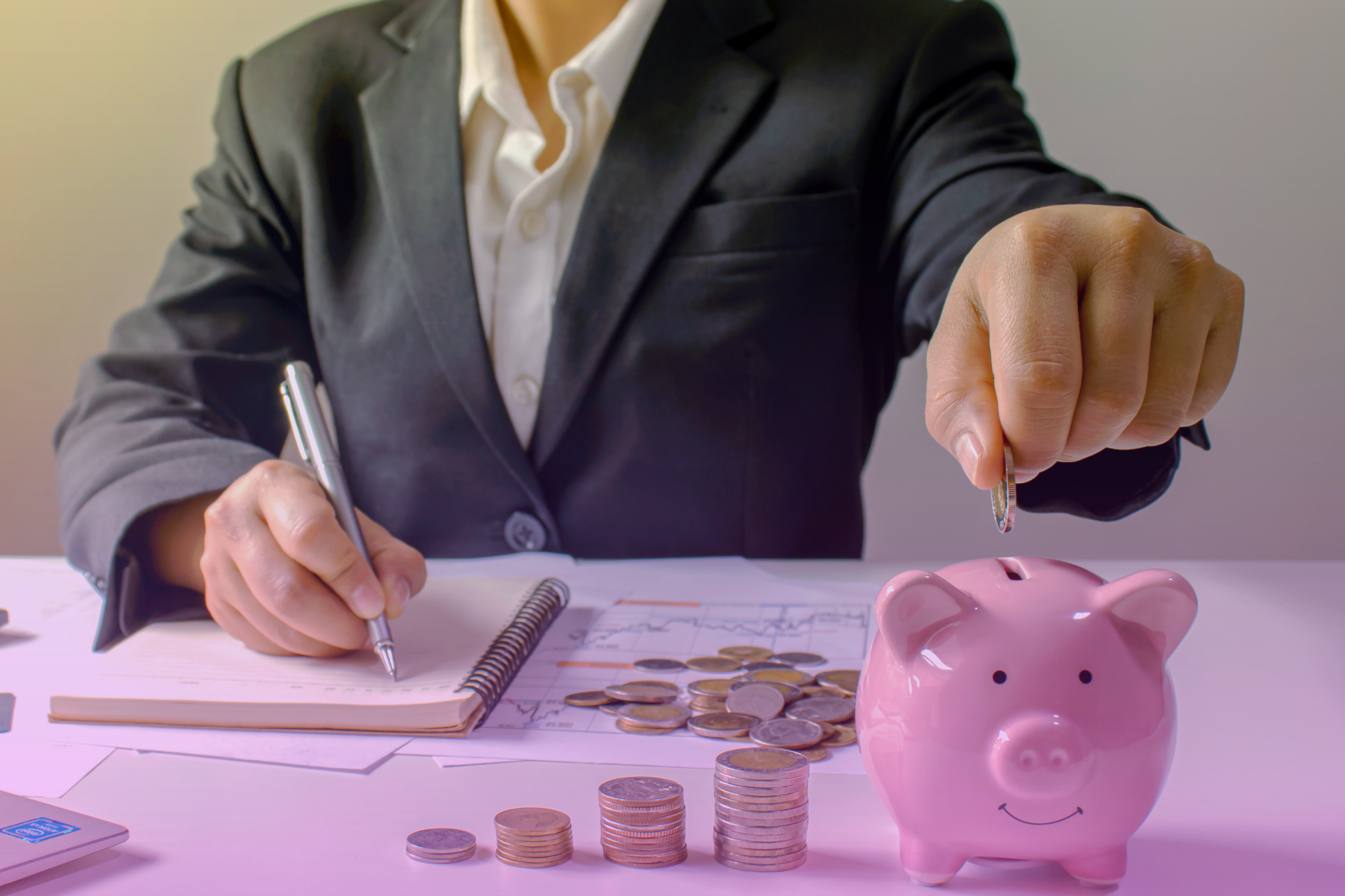 A clear, transparent piggy bank filled with coins, illustrating financial openness and clarity.