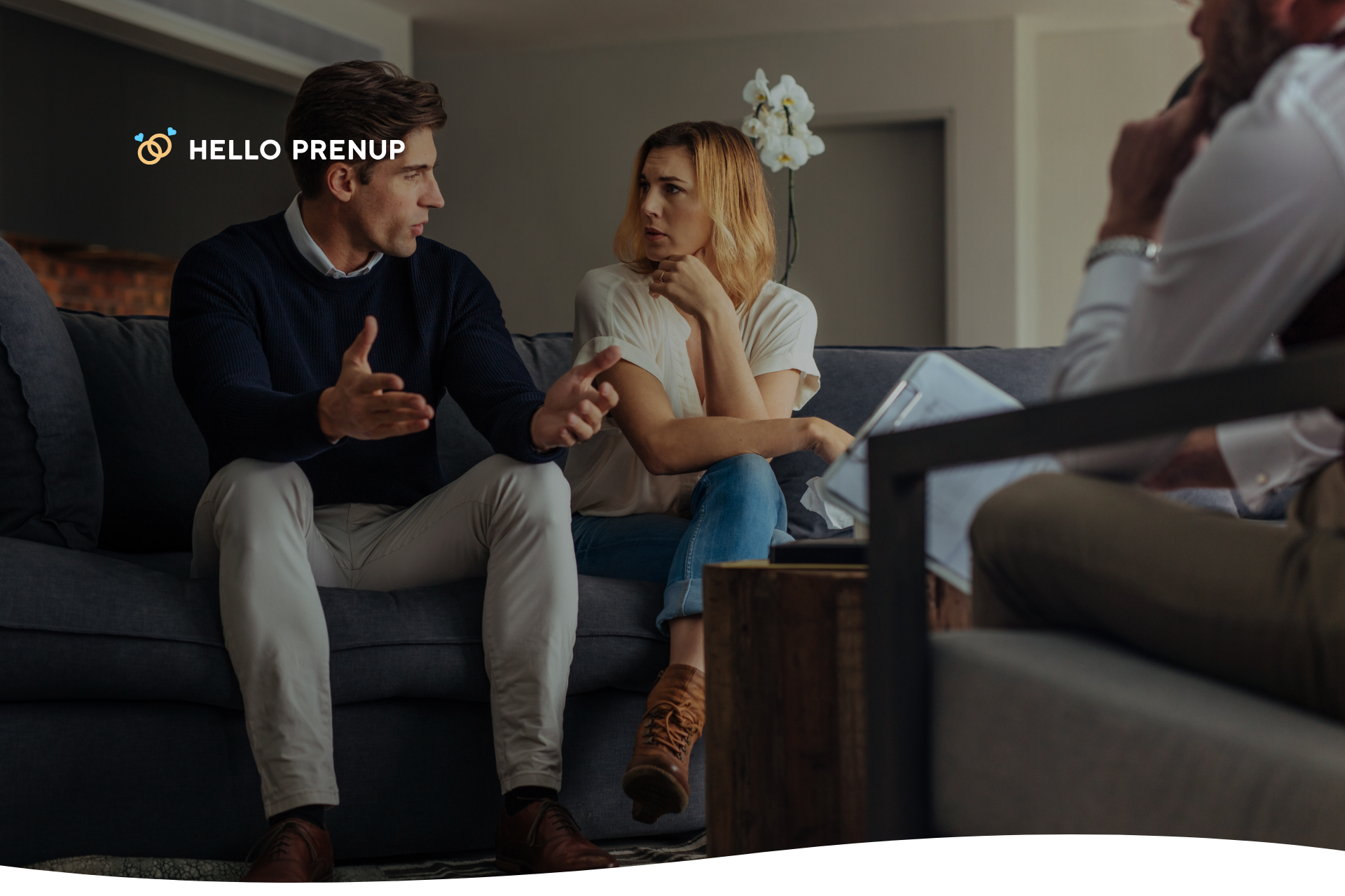 A couple sitting opposite a therapist, engaged in a serious and emotional discussion, representing the process of recovering from betrayal.