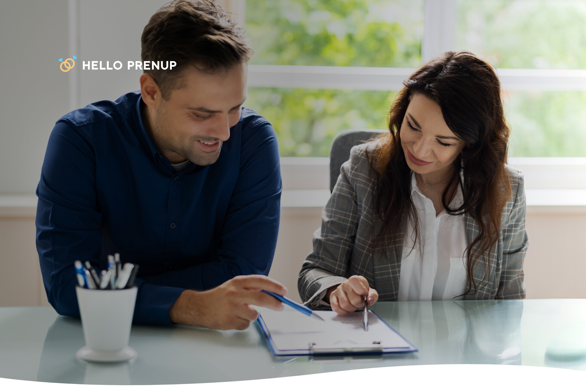 A couple thoughtfully reviewing legal documents together, highlighting the need for careful consideration, ideally with legal guidance.
