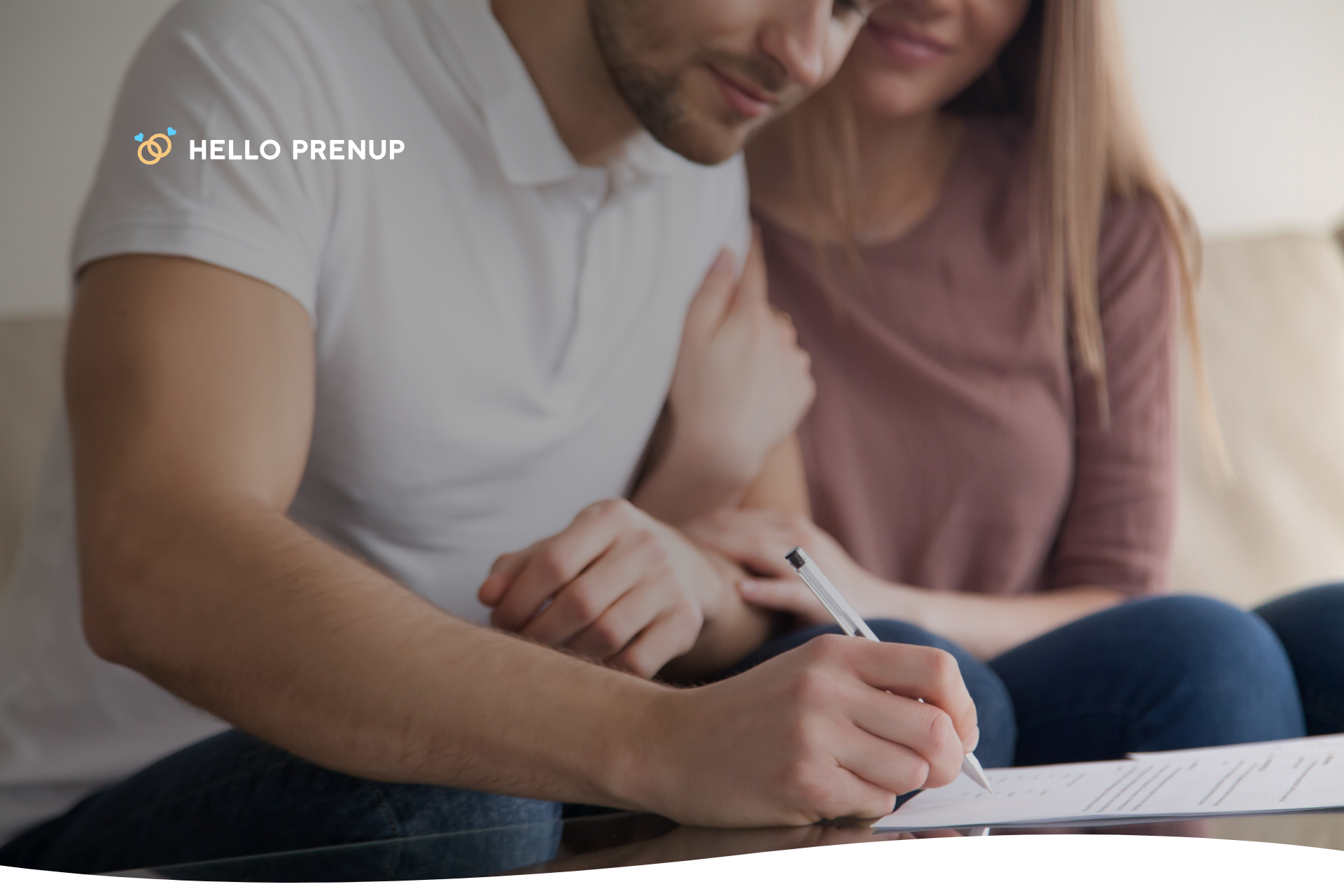 A newly married couple sitting at a table, jointly reviewing and signing legal documents, symbolizing their shared commitment to financial planning.
